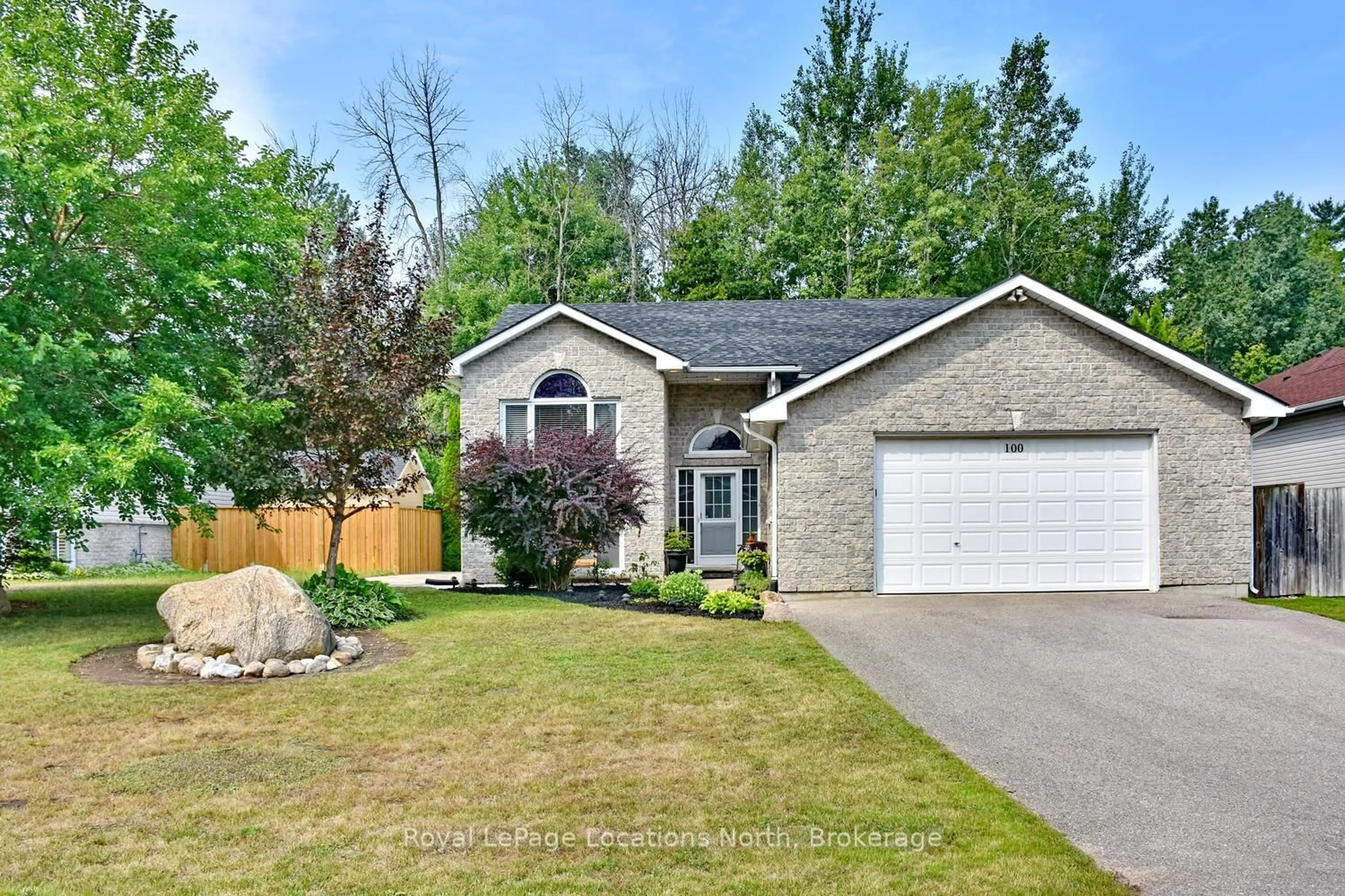 Home with brick exterior material, street for 100 62ND St, Wasaga Beach Ontario L9Z 2Z4