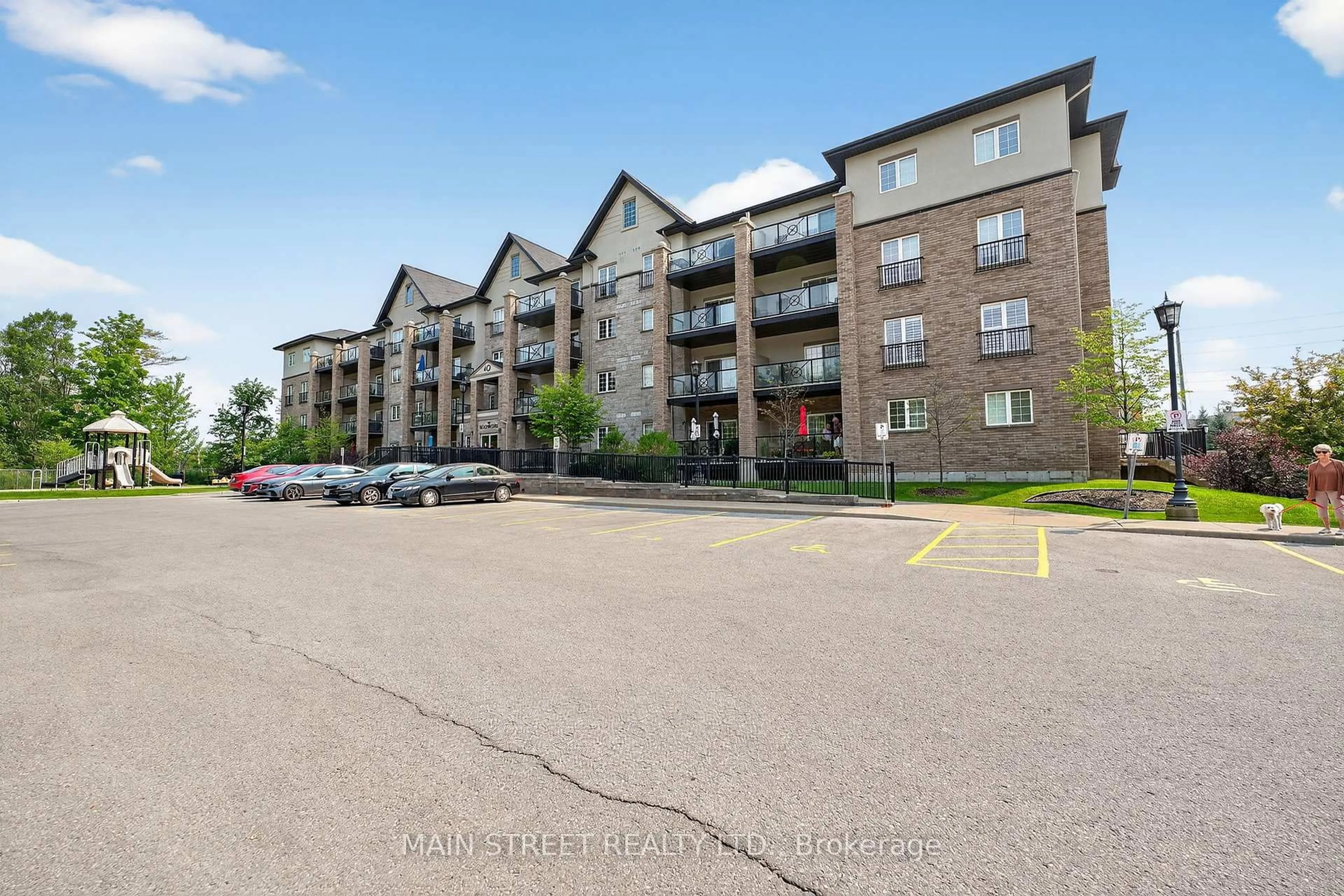 A pic from outside/outdoor area/front of a property/back of a property/a pic from drone, unknown for 40 Ferndale Dr #303, Barrie Ontario L4N 2L3
