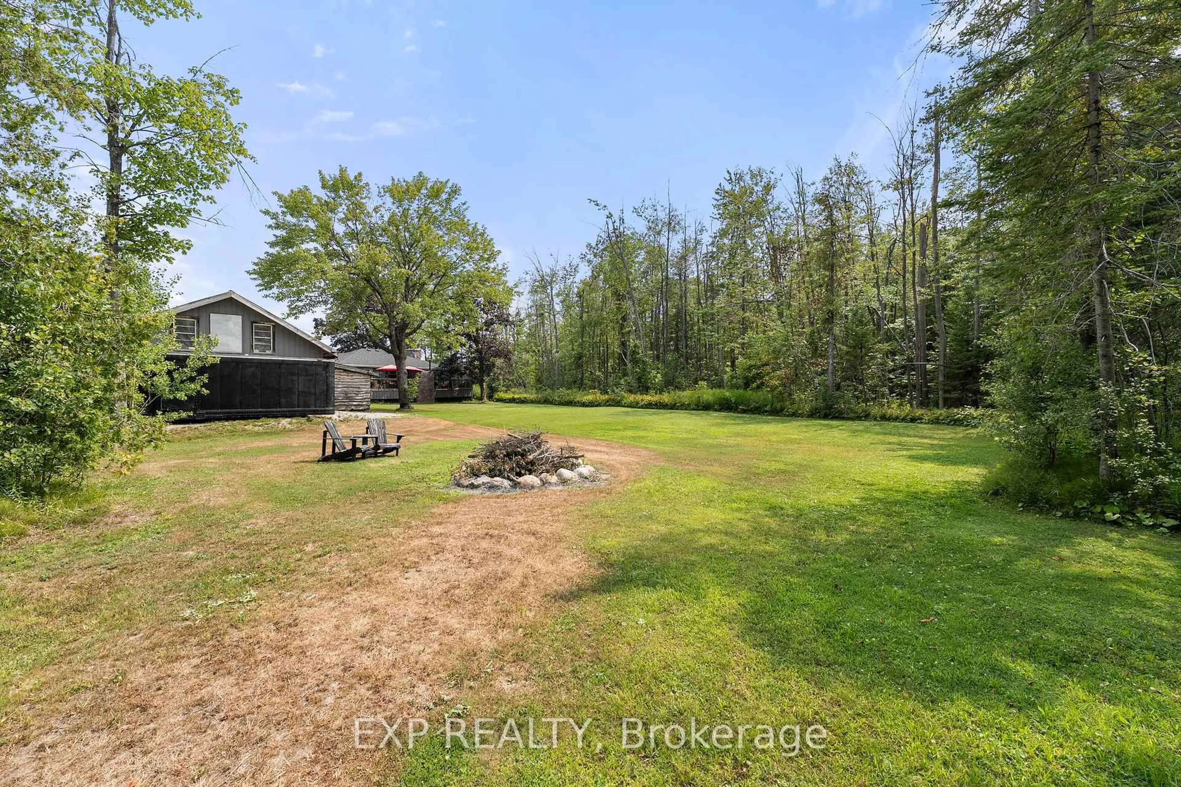 A pic from outside/outdoor area/front of a property/back of a property/a pic from drone, water/lake/river/ocean view for 5514 Highway 11 South, R R 1, Oro-Medonte Ontario L3V 8H2