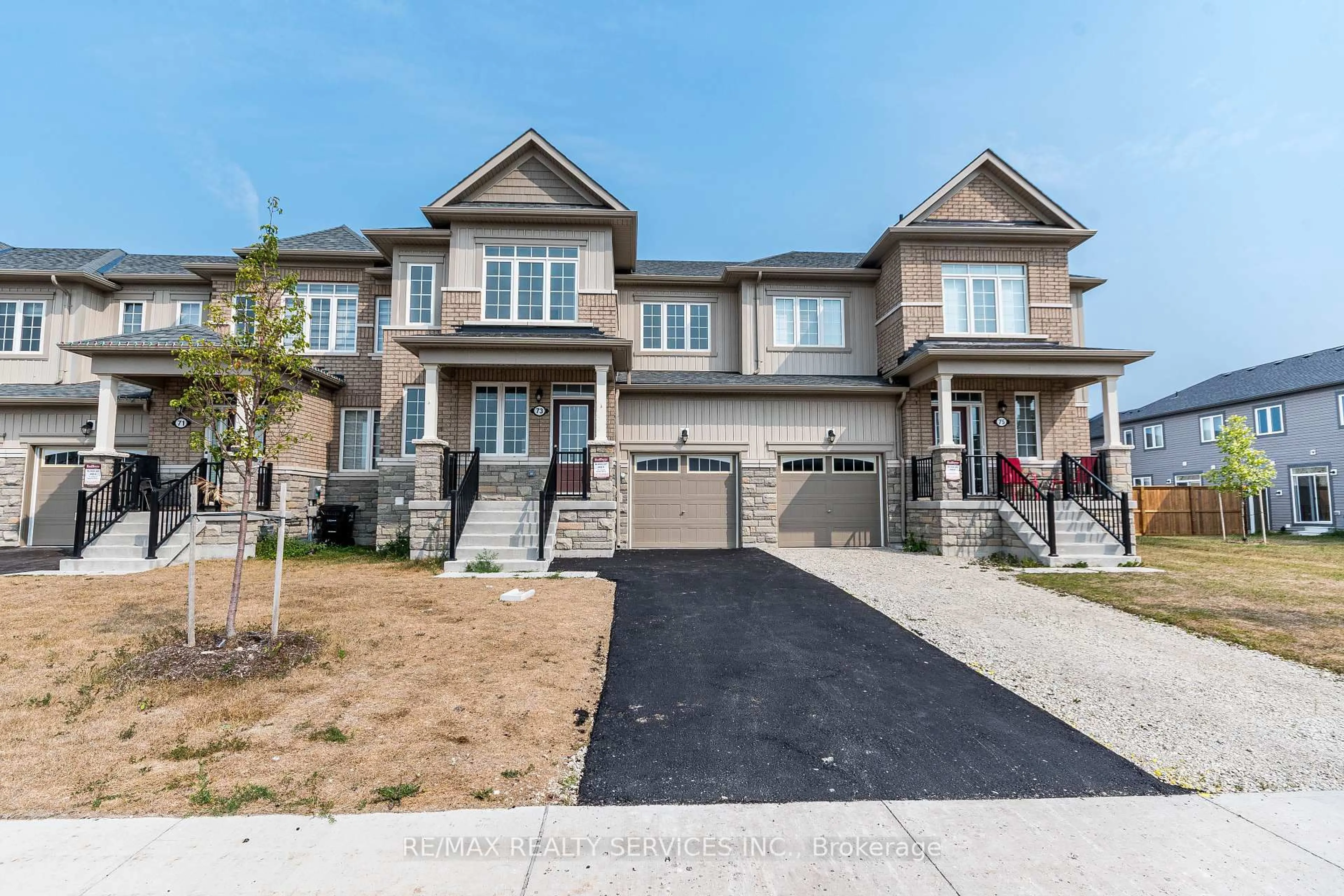 Home with brick exterior material, street for 73 Central Square Blvd, Wasaga Beach Ontario L9Z 0L9