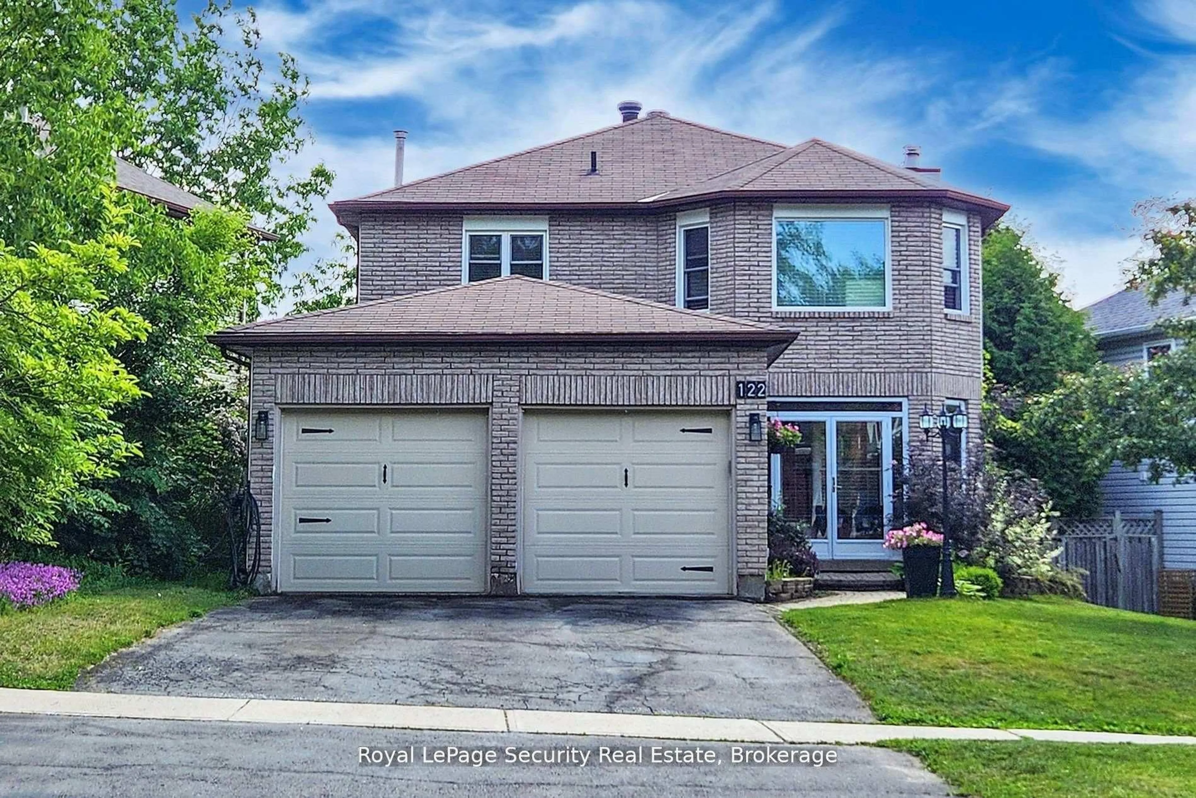 Home with brick exterior material, street for 122 Browning Tr, Barrie Ontario L4N 6R3