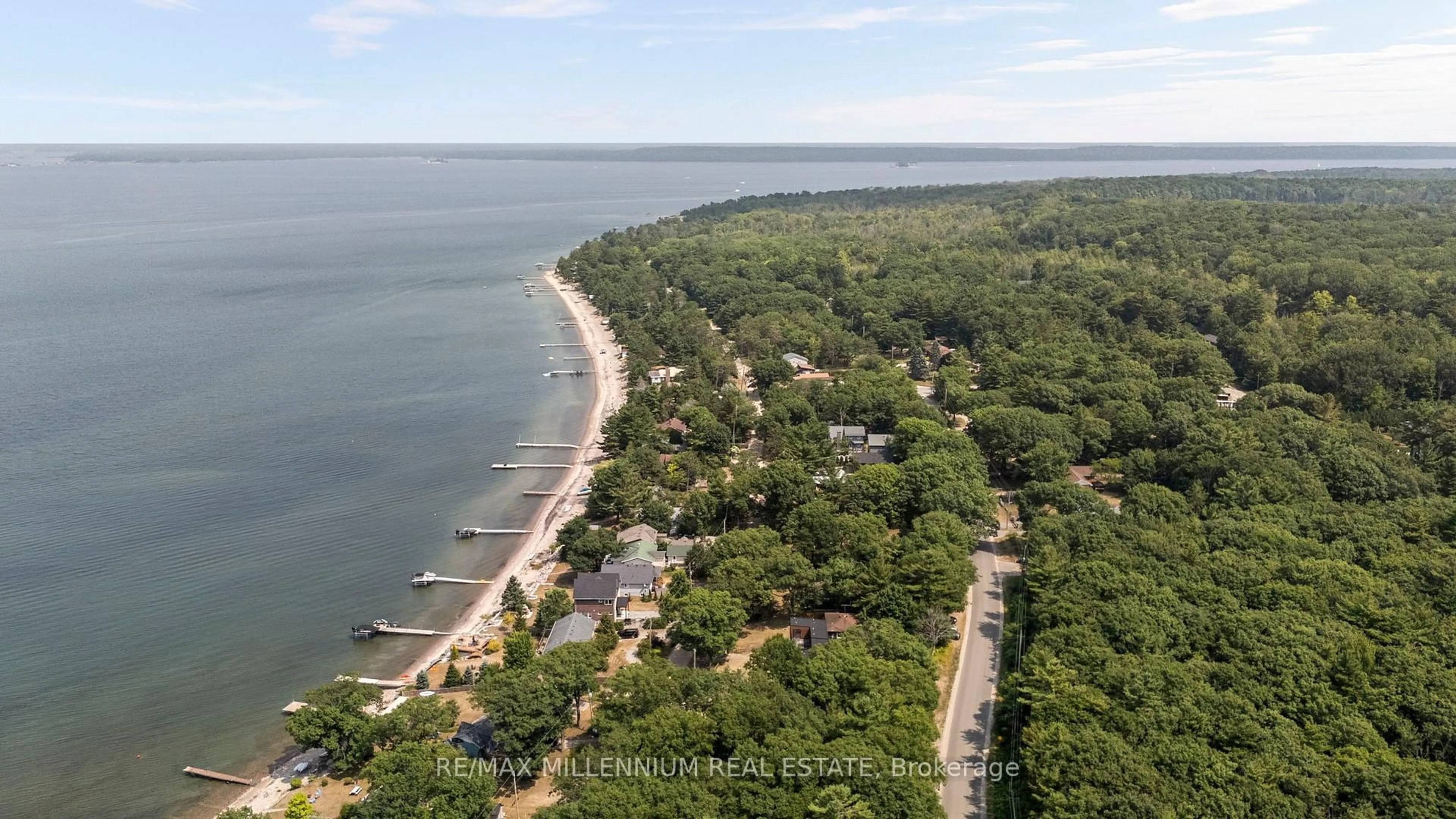 A pic from outside/outdoor area/front of a property/back of a property/a pic from drone, water/lake/river/ocean view for 82 Beach Rd, Tiny Ontario L9M 1R2