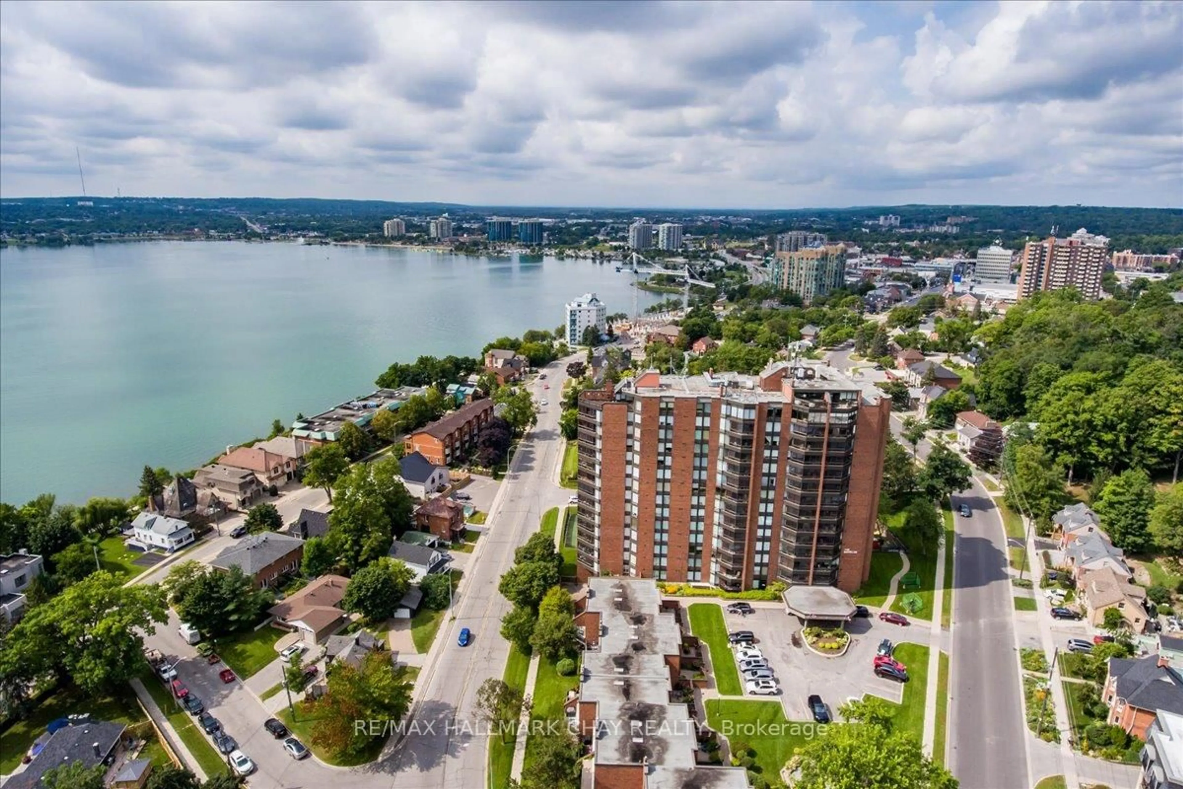 A pic from outside/outdoor area/front of a property/back of a property/a pic from drone, water/lake/river/ocean view for 181 Collier St #204, Barrie Ontario L4M 5L6