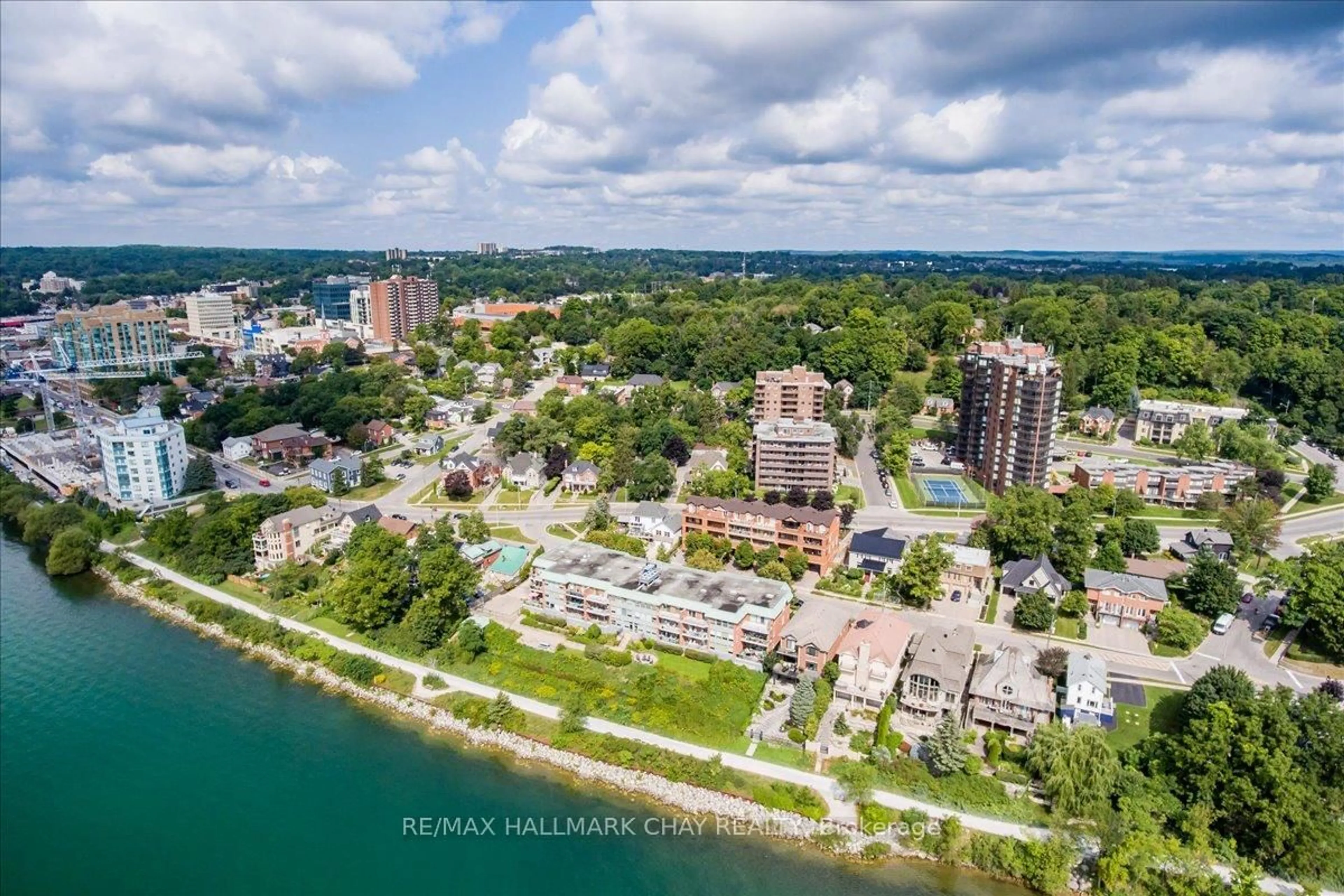 A pic from outside/outdoor area/front of a property/back of a property/a pic from drone, water/lake/river/ocean view for 181 Collier St #204, Barrie Ontario L4M 5L6