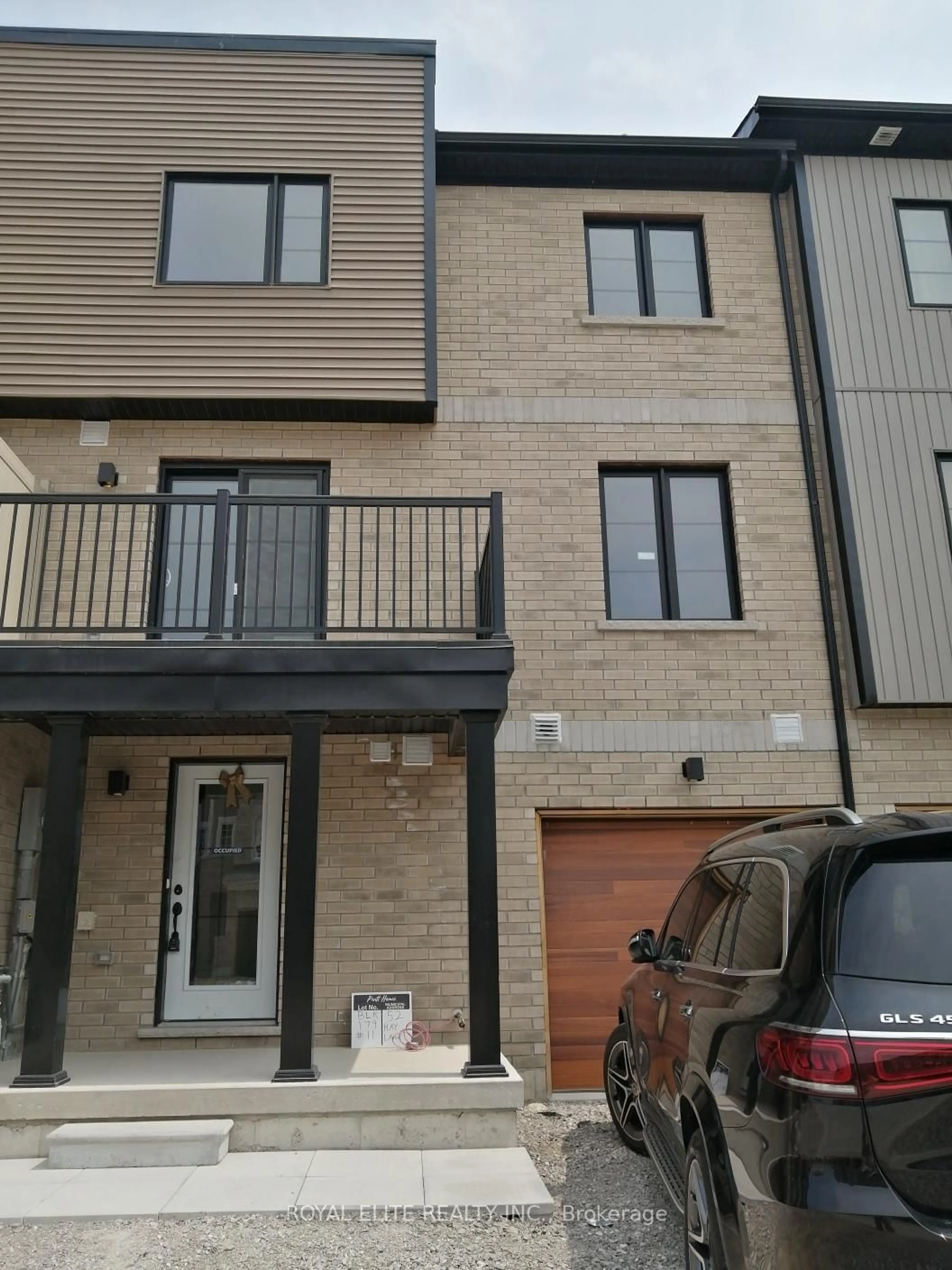Home with brick exterior material, street for 52 HAY Lane, Barrie Ontario L9N 0T8