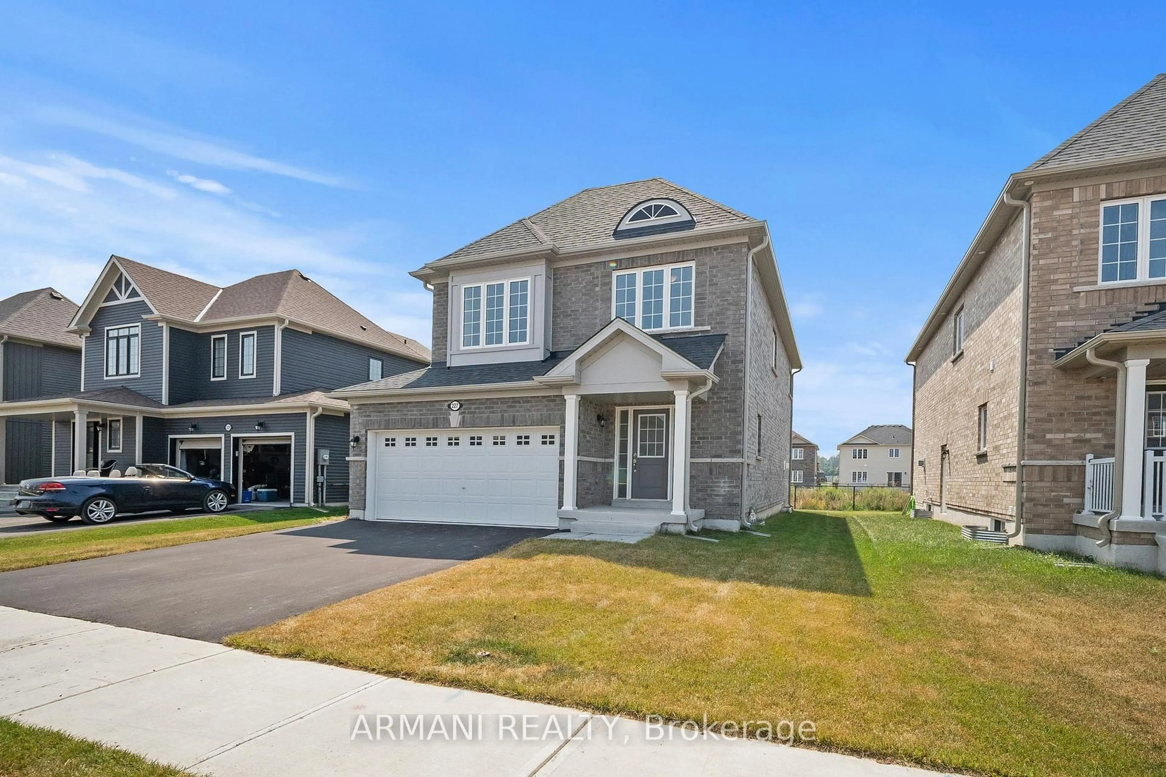 Home with vinyl exterior material, street for 227 Mckenzie Dr, Clearview Ontario L0M 1S0