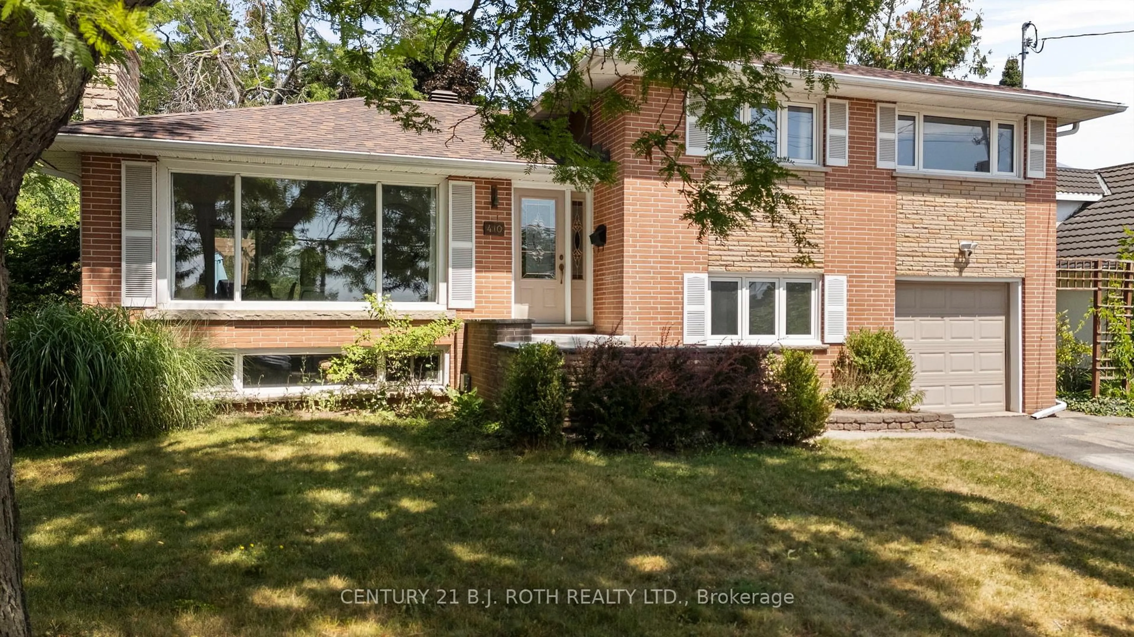 Home with brick exterior material, street for 410 CODRINGTON St, Barrie Ontario L4M 1T3