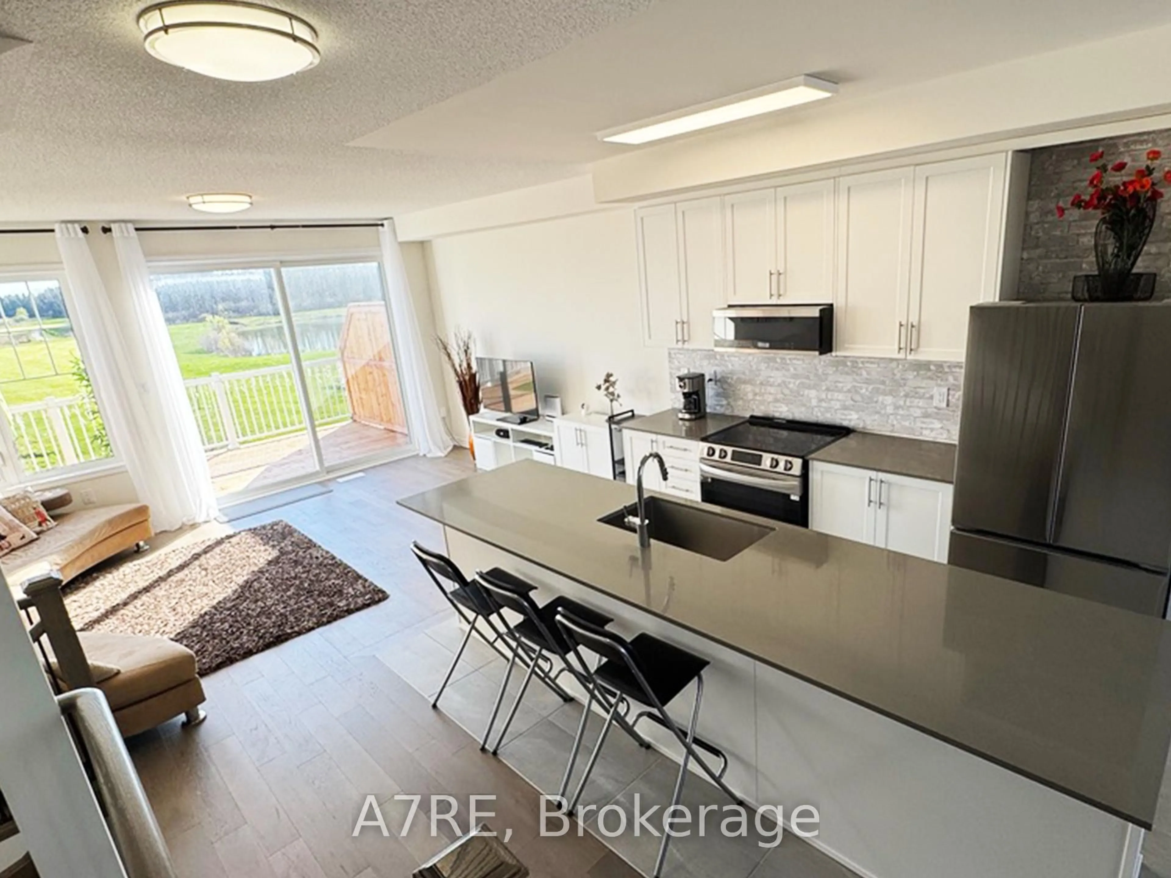 Open concept kitchen, ceramic/tile floor for 27 Sama Way, Wasaga Beach Ontario L9Z 0K4