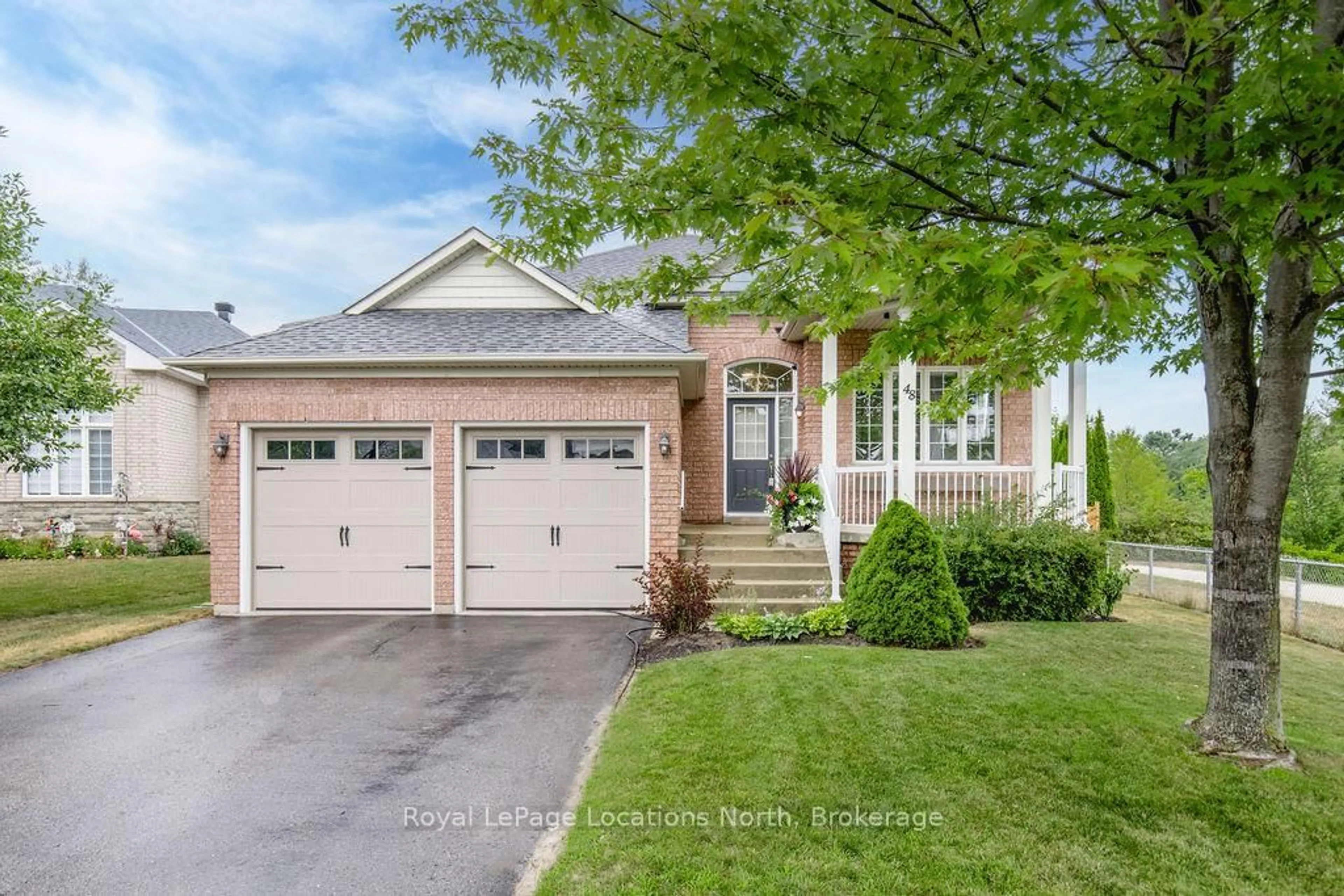 Home with brick exterior material, street for 48 MEADOWLARK Blvd, Wasaga Beach Ontario L9Z 3B2