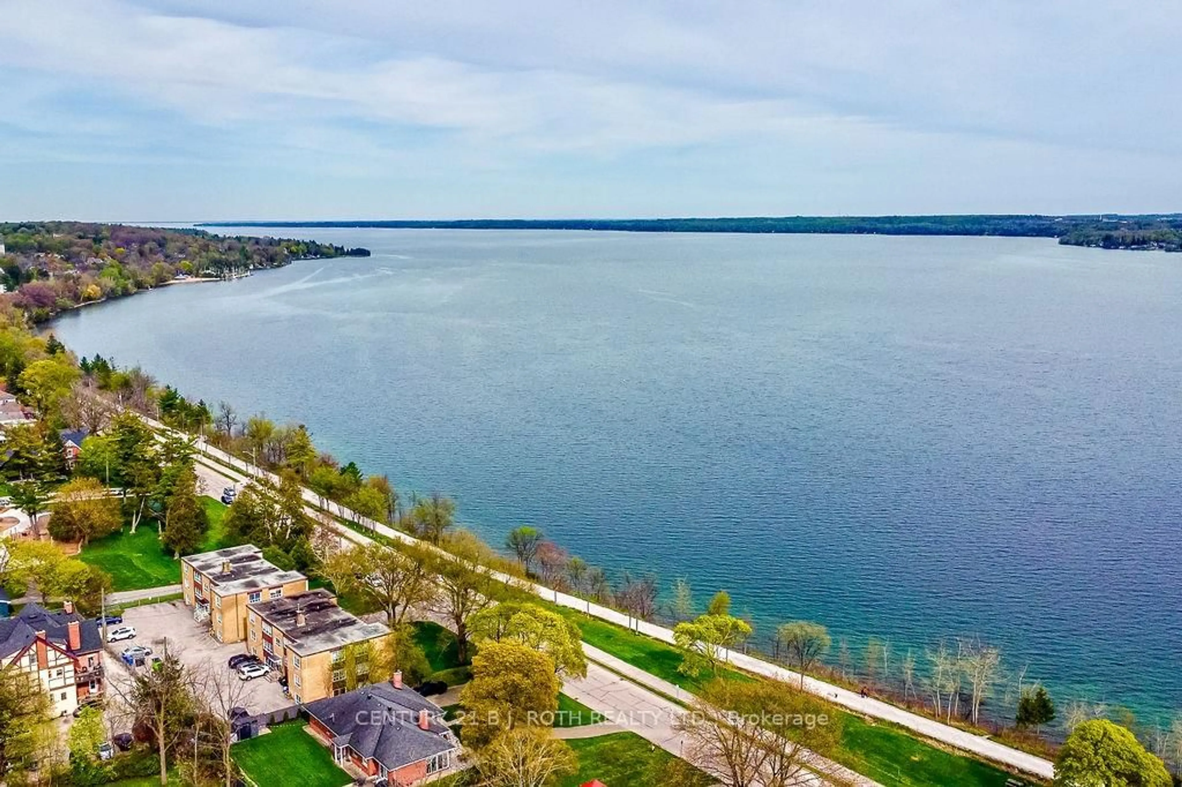 A pic from outside/outdoor area/front of a property/back of a property/a pic from drone, water/lake/river/ocean view for 181 Collier St #405, Barrie Ontario L4M 5L6