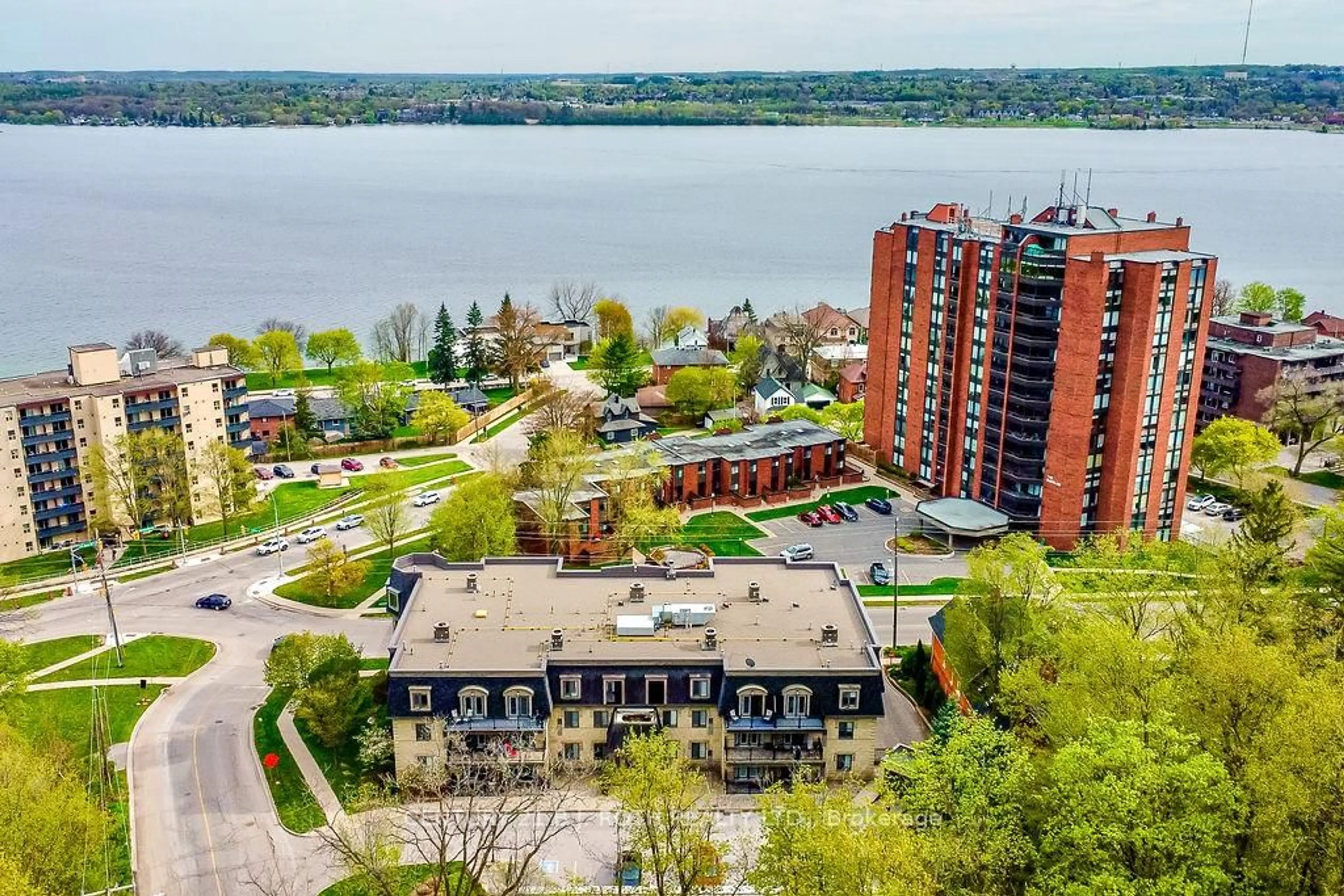A pic from outside/outdoor area/front of a property/back of a property/a pic from drone, water/lake/river/ocean view for 181 Collier St #405, Barrie Ontario L4M 5L6