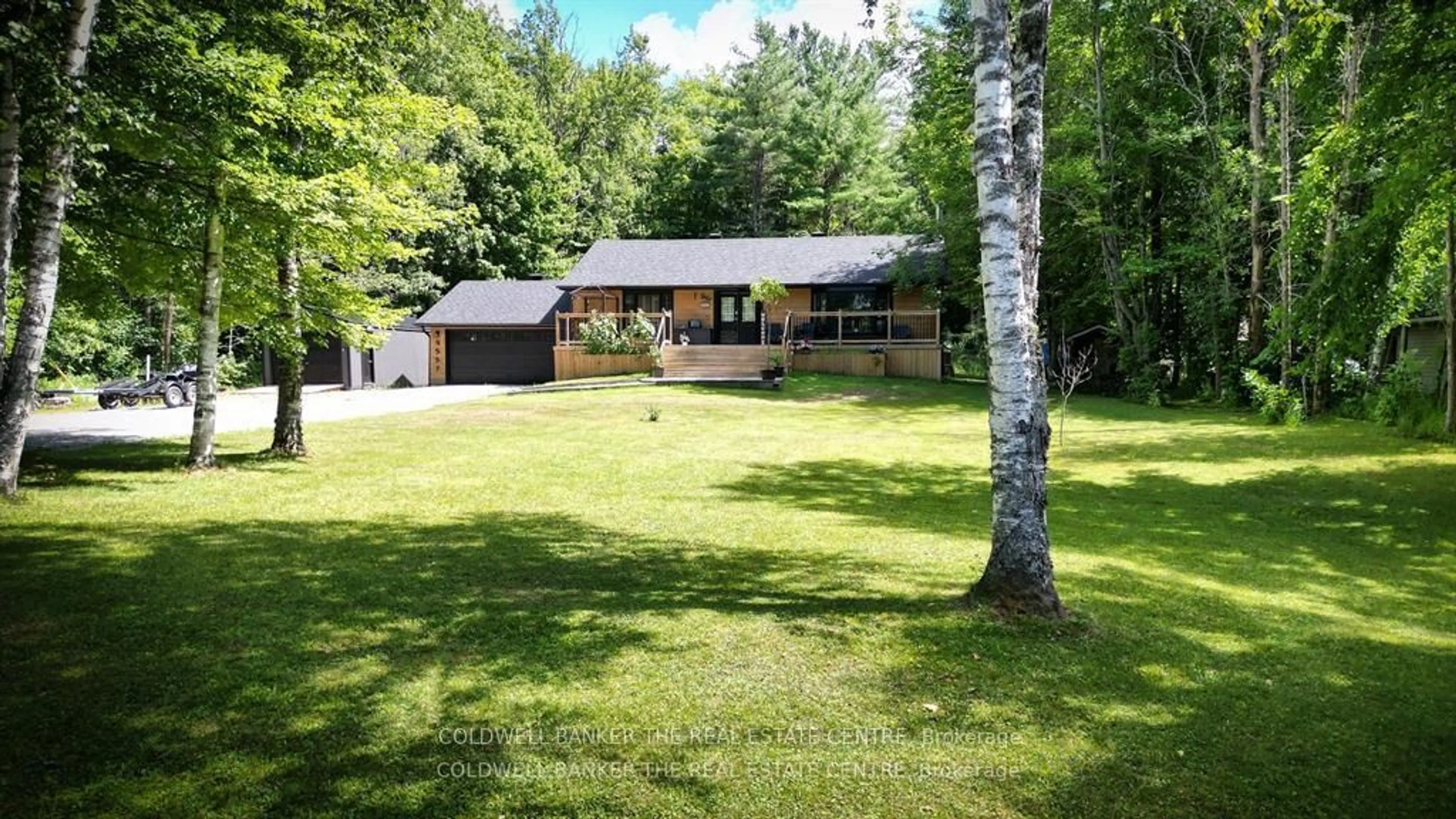 A pic from outside/outdoor area/front of a property/back of a property/a pic from drone, forest/trees view for 4557 Trent Tr, Severn Ontario L0K 2B0