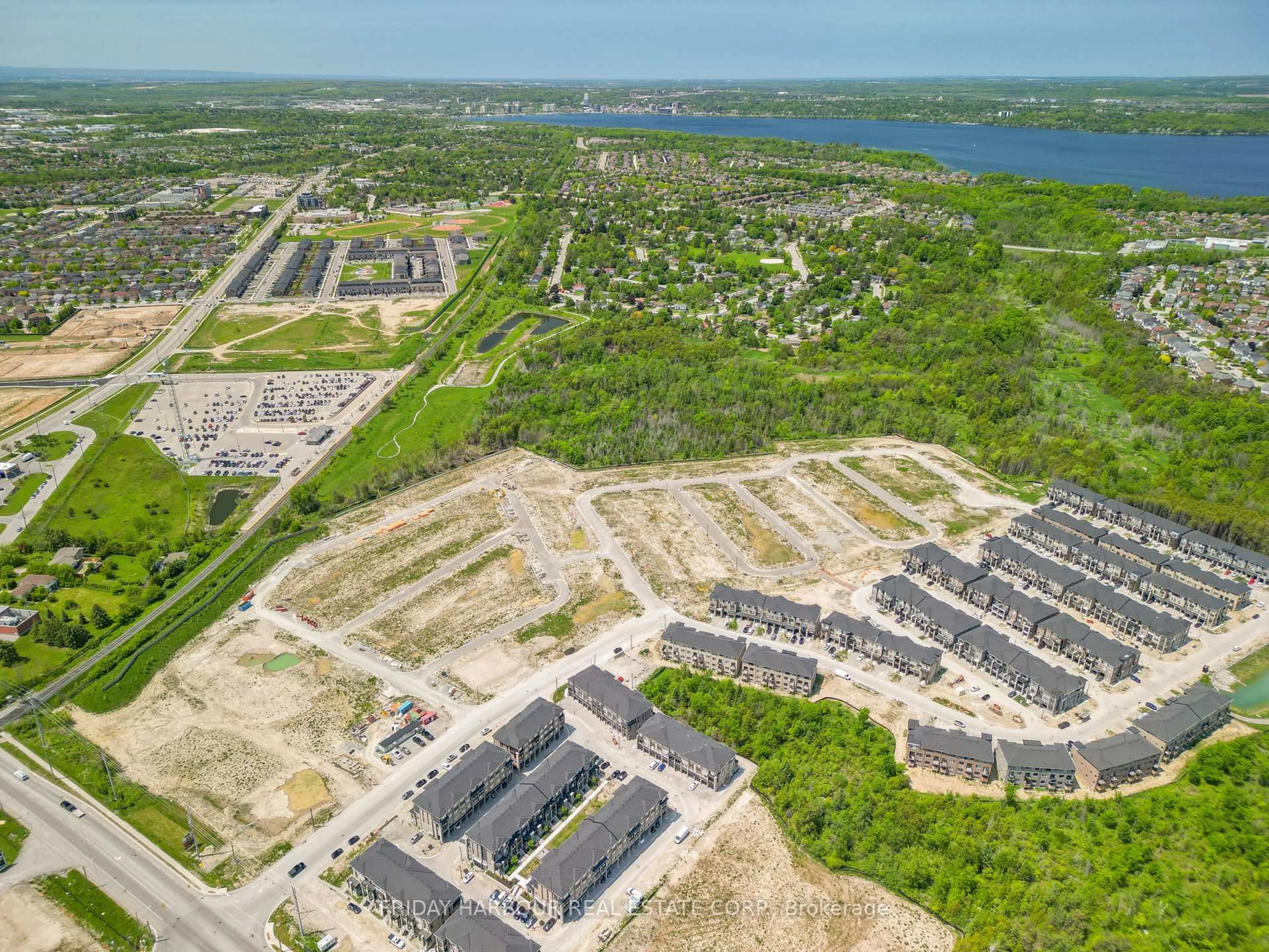 A pic from outside/outdoor area/front of a property/back of a property/a pic from drone, street for 14 Spry Lane #410, Barrie Ontario L4N 4H7