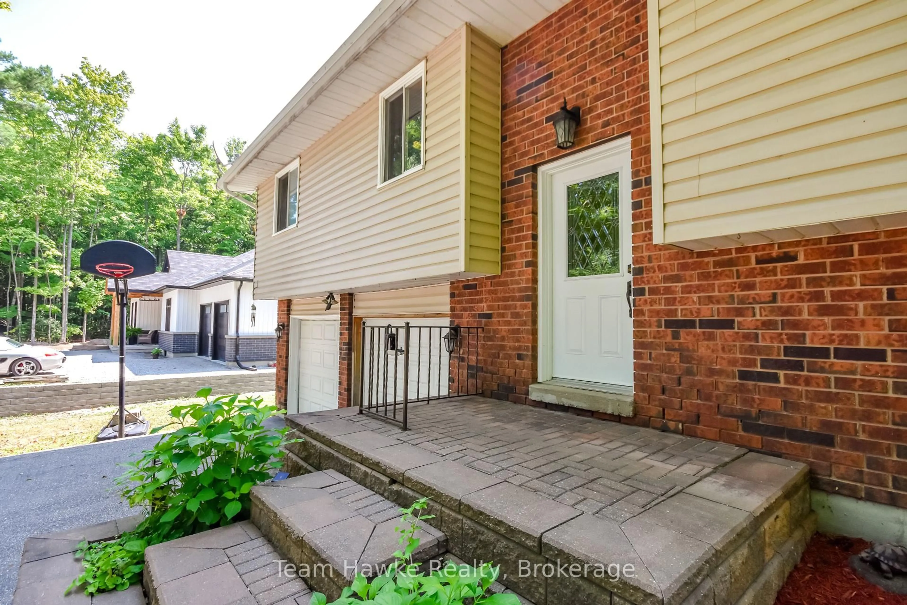Home with brick exterior material, street for 40 St. Laurent Blvd, Tiny Ontario L9M 0J2