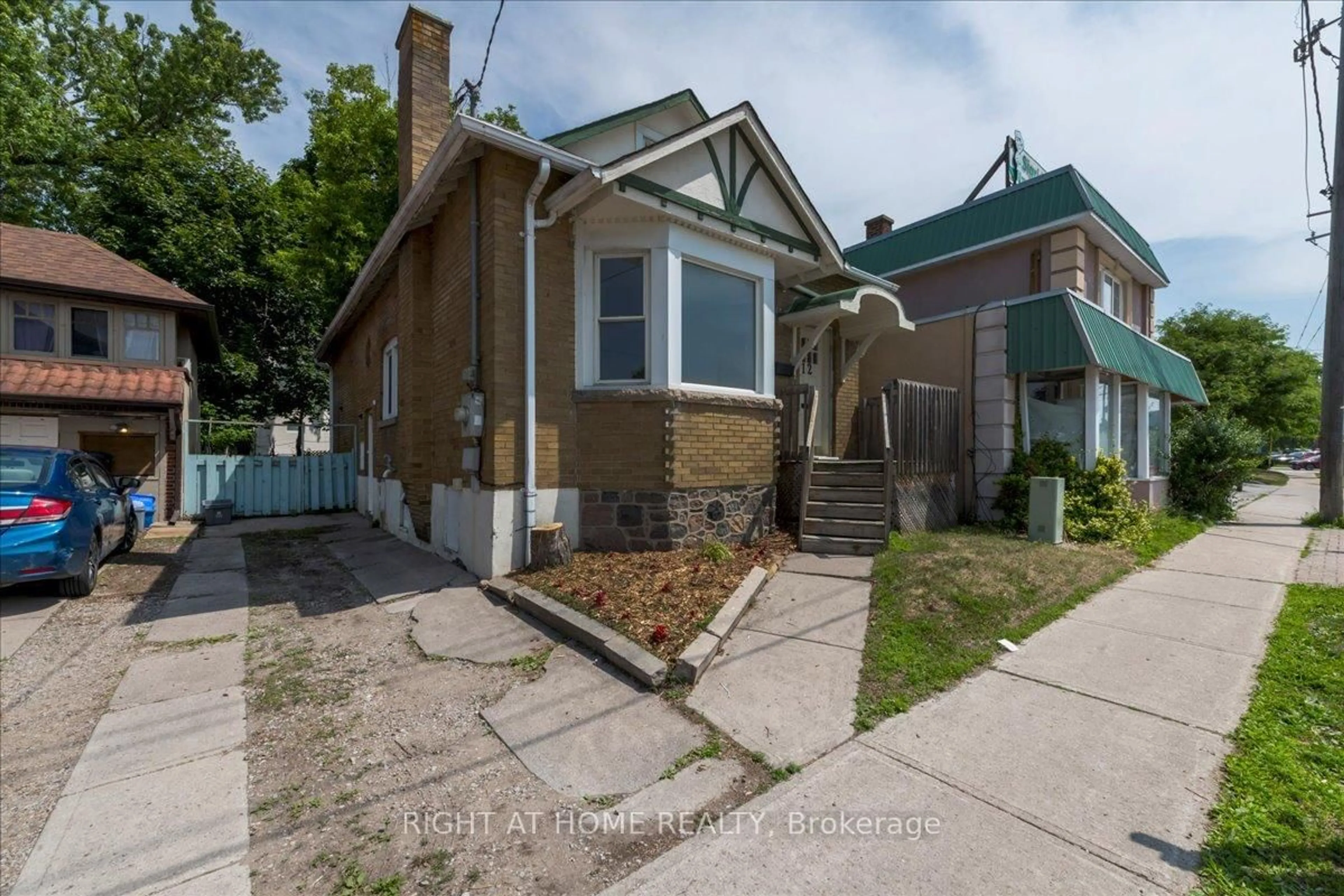 Home with brick exterior material, street for 12 Ross St, Barrie Ontario L4N 1E7