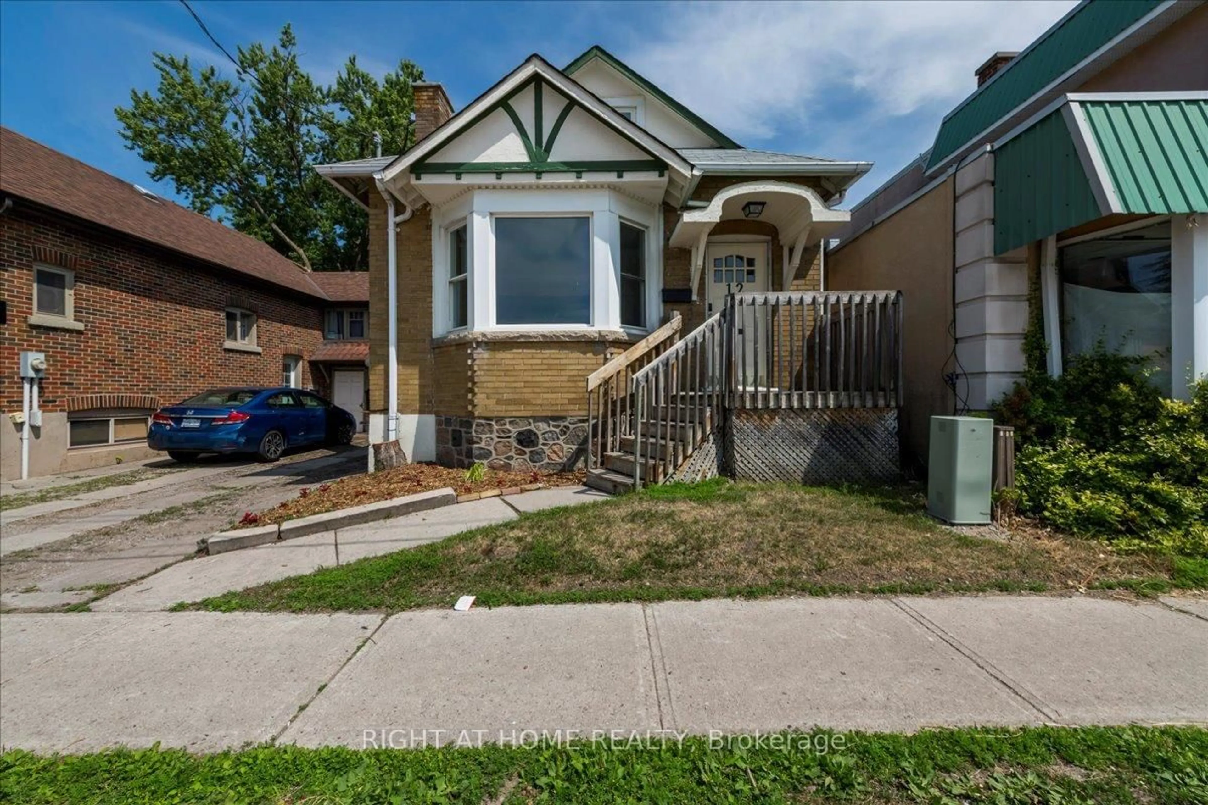 Home with brick exterior material, street for 12 Ross St, Barrie Ontario L4N 1E7