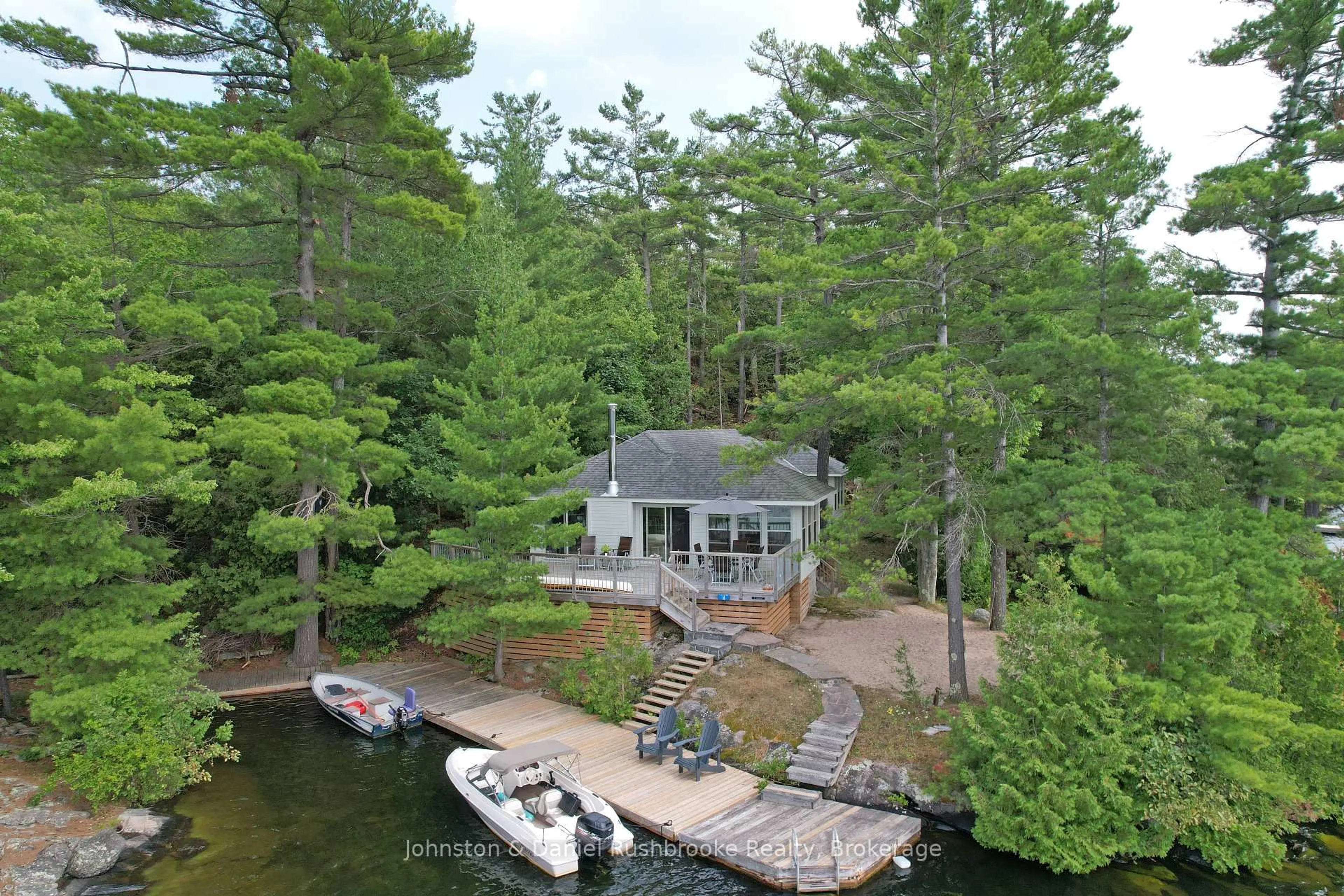 A pic from outside/outdoor area/front of a property/back of a property/a pic from drone, water/lake/river/ocean view for 18 Island 340 (Marie Island), Georgian Bay Ontario L0K 2C0