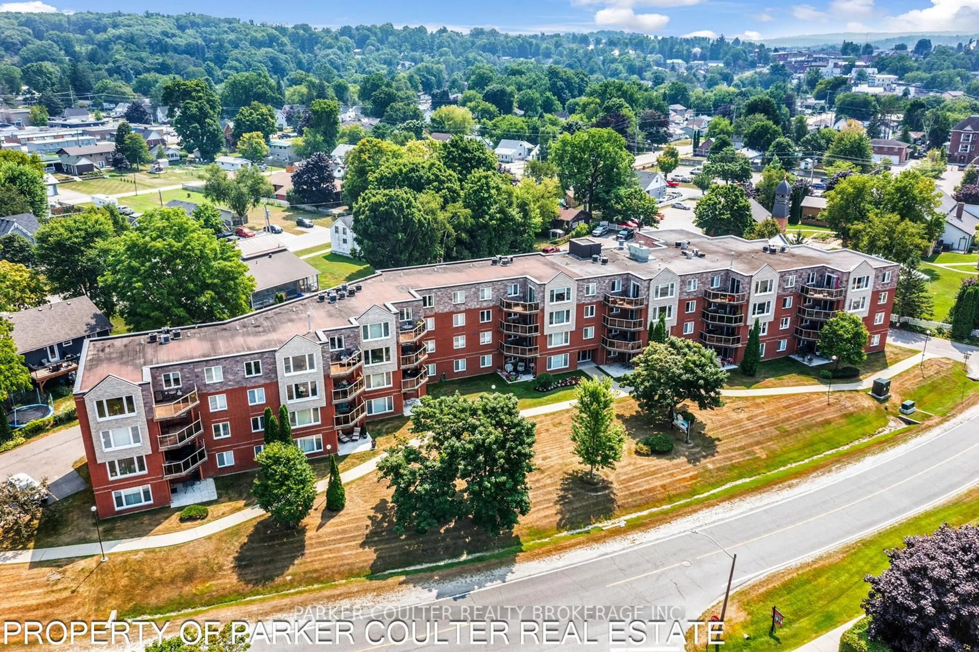 A pic from outside/outdoor area/front of a property/back of a property/a pic from drone, city buildings view from balcony for 11 Beck Blvd #103, Penetanguishene Ontario L9M 2G1