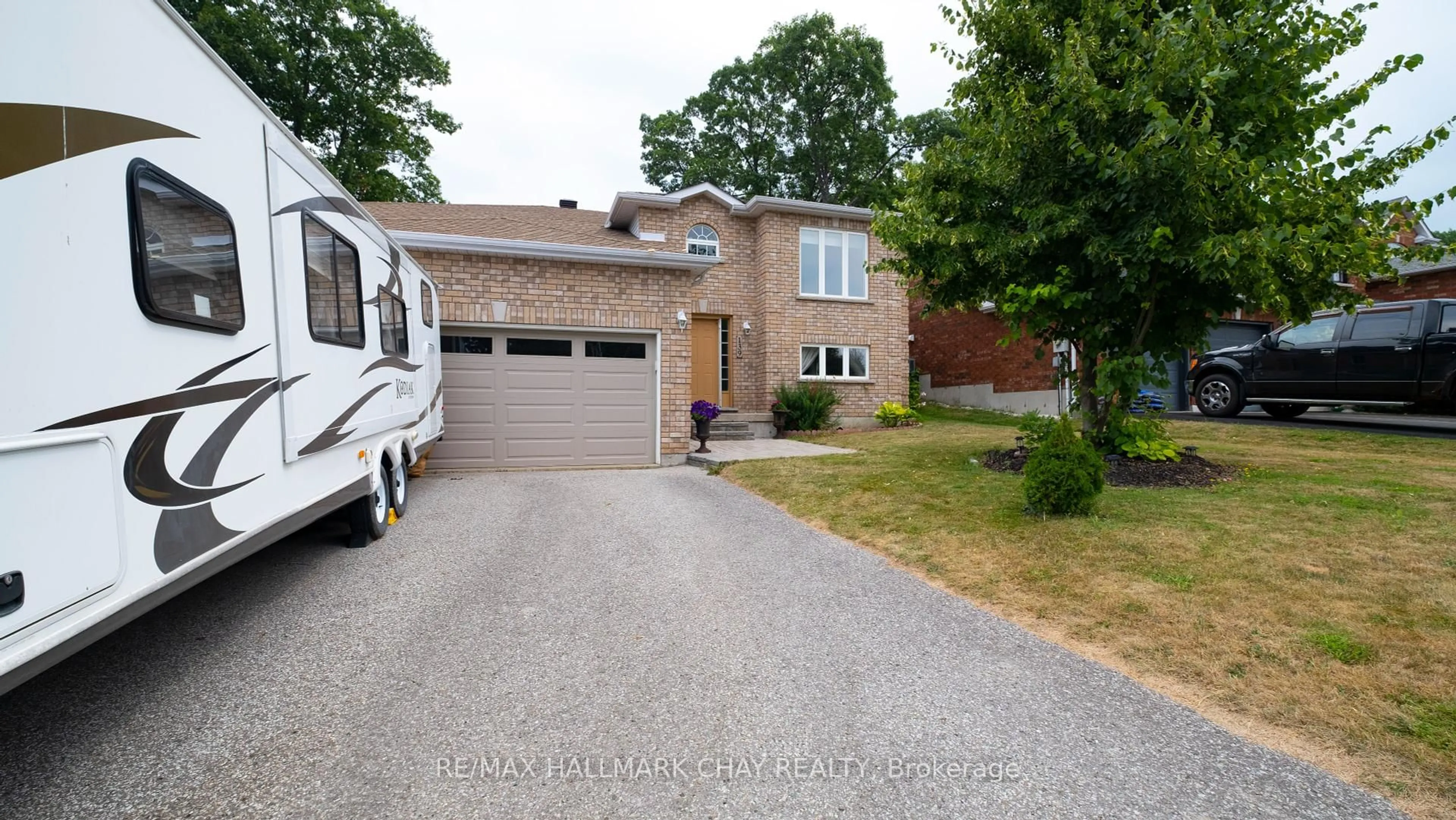 Home with brick exterior material, street for 139 WAWINET St, Midland Ontario L4R 5A9