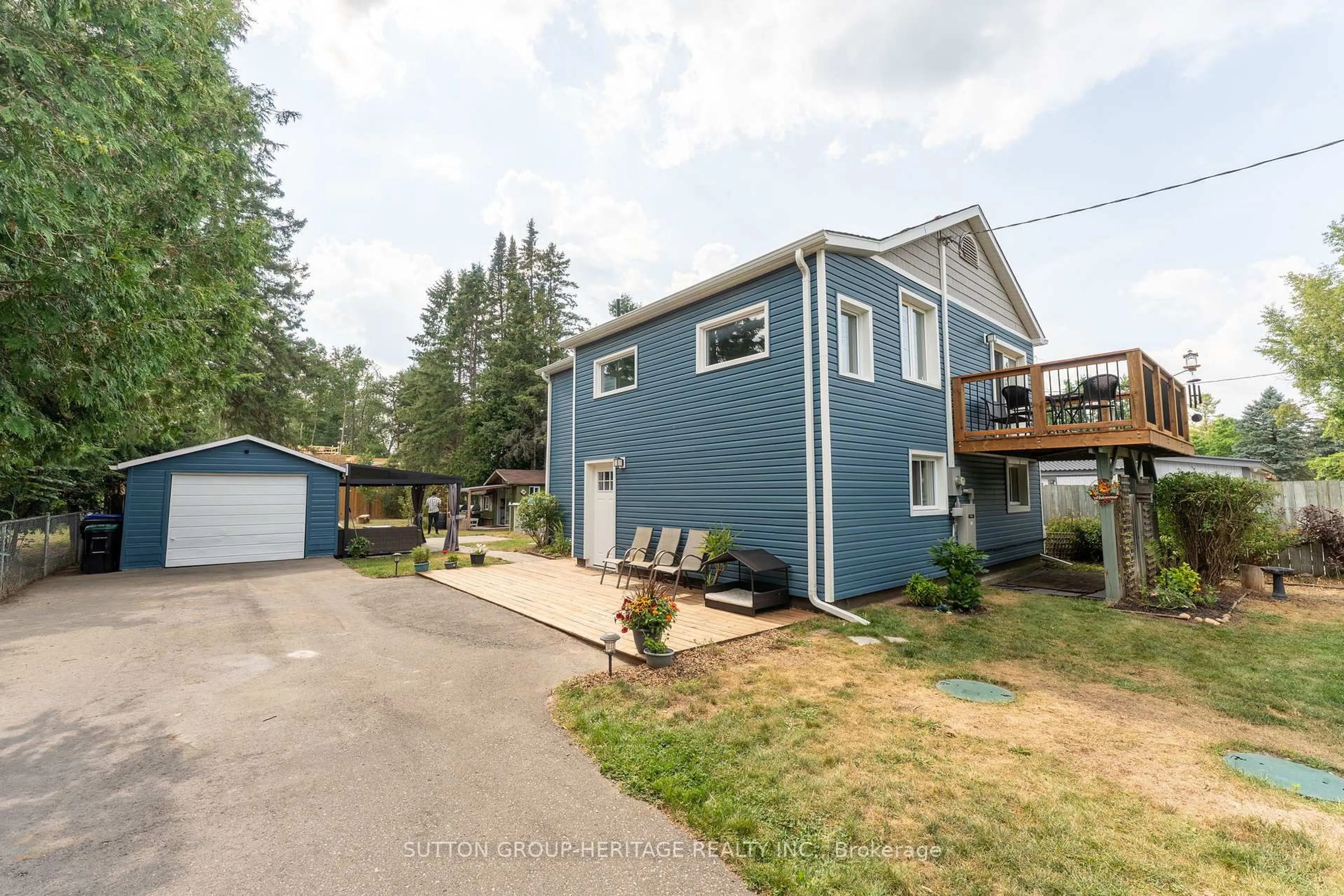 A pic from outside/outdoor area/front of a property/back of a property/a pic from drone, street for 3660 Baldwick Lane, Springwater Ontario L0M 1T2