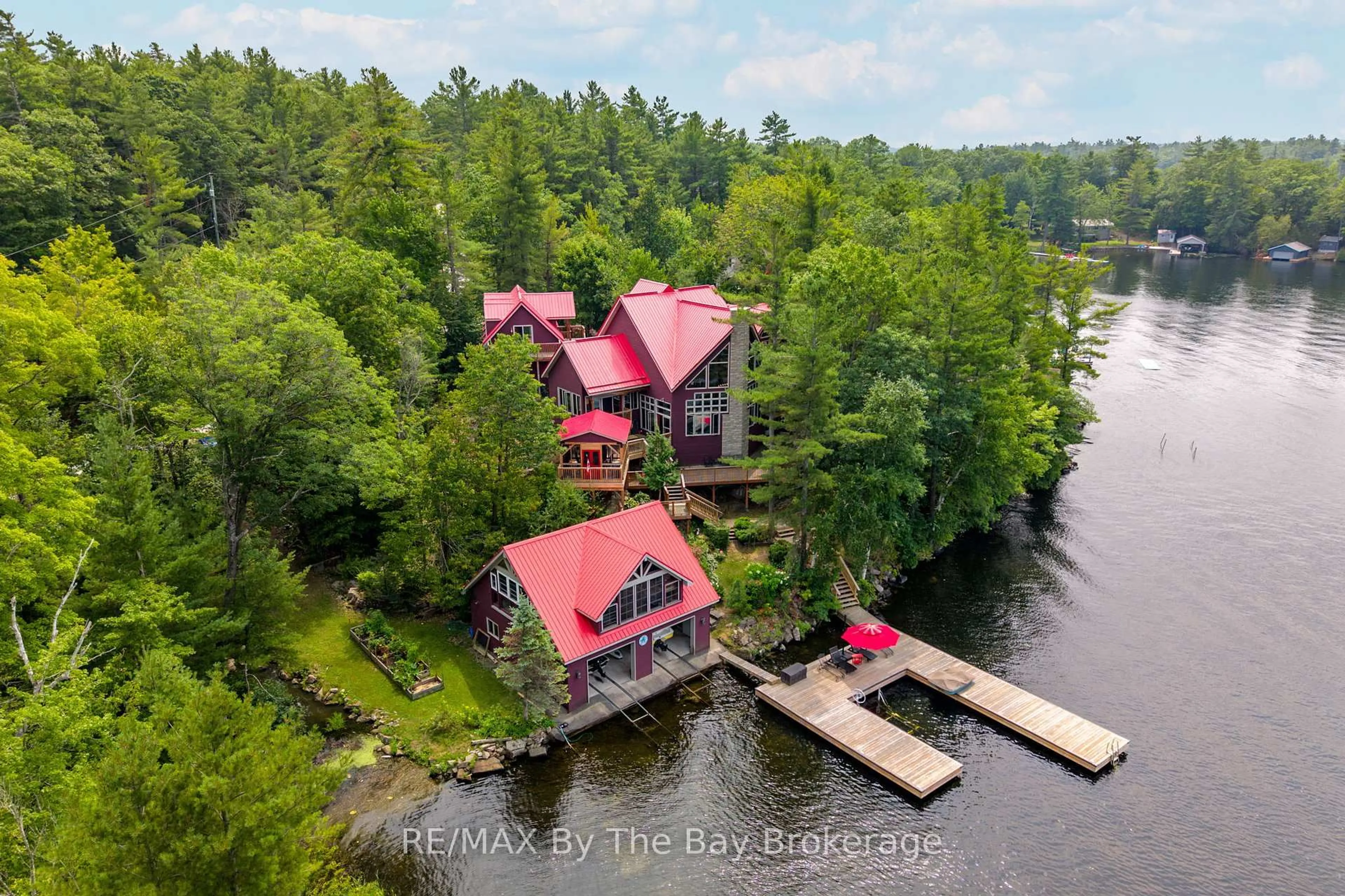 A pic from outside/outdoor area/front of a property/back of a property/a pic from drone, water/lake/river/ocean view for 4104 East Shore Rd, Severn Ontario L0K 1E0