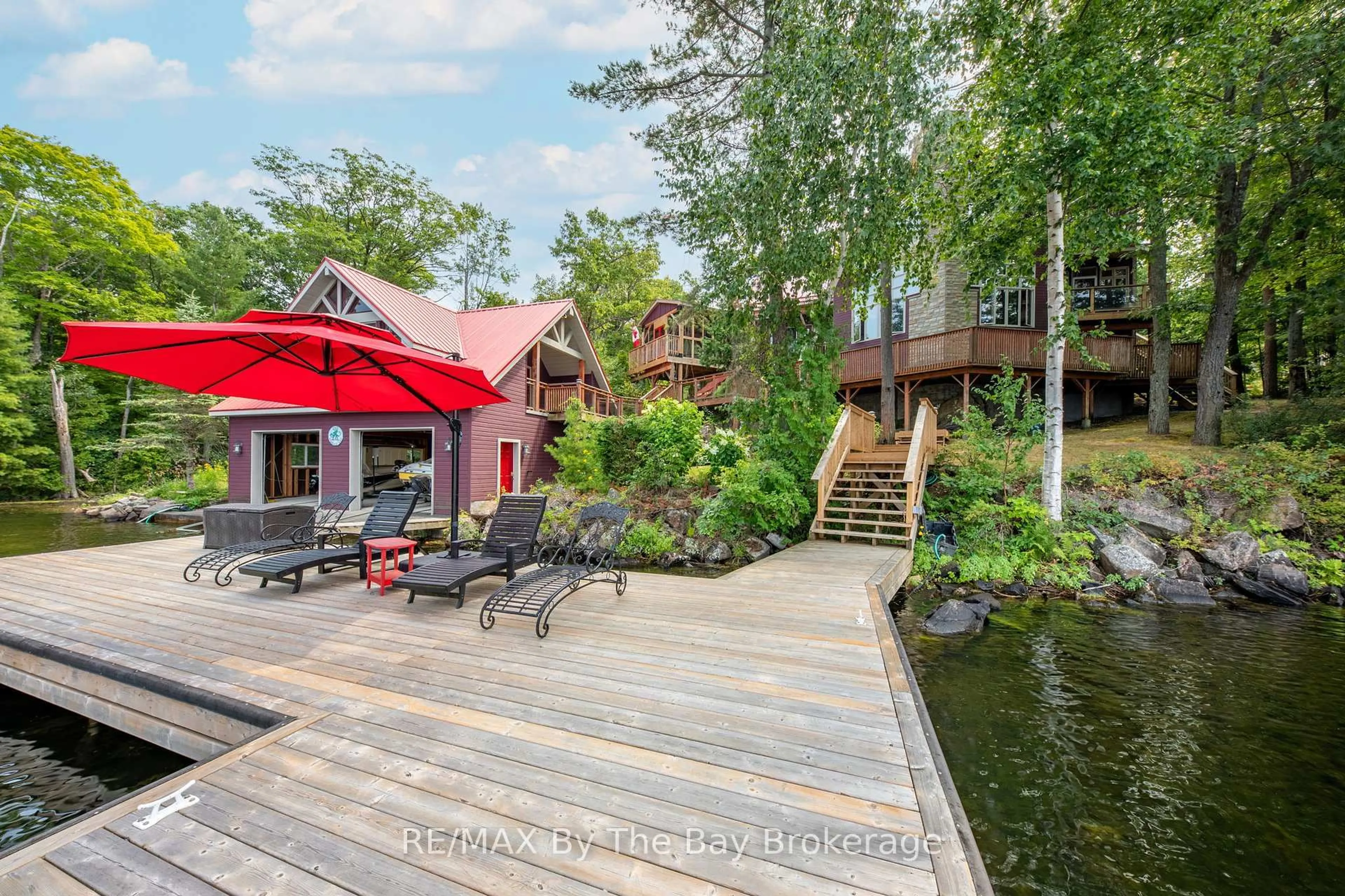 A pic from outside/outdoor area/front of a property/back of a property/a pic from drone, water/lake/river/ocean view for 4104 East Shore Rd, Severn Ontario L0K 1E0