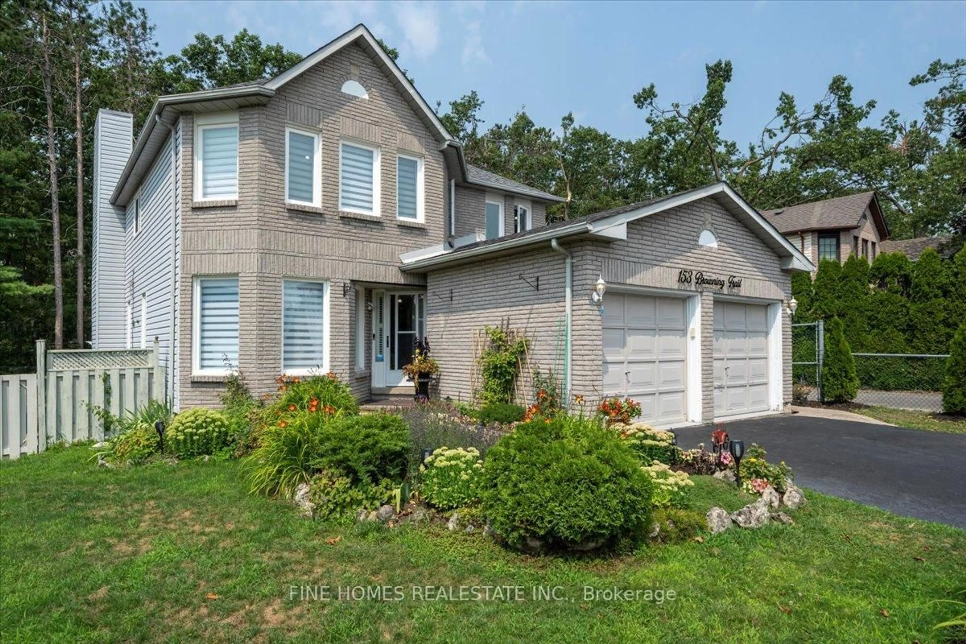 Home with brick exterior material, street for 153 Browning Tr, Barrie Ontario L4N 6R2