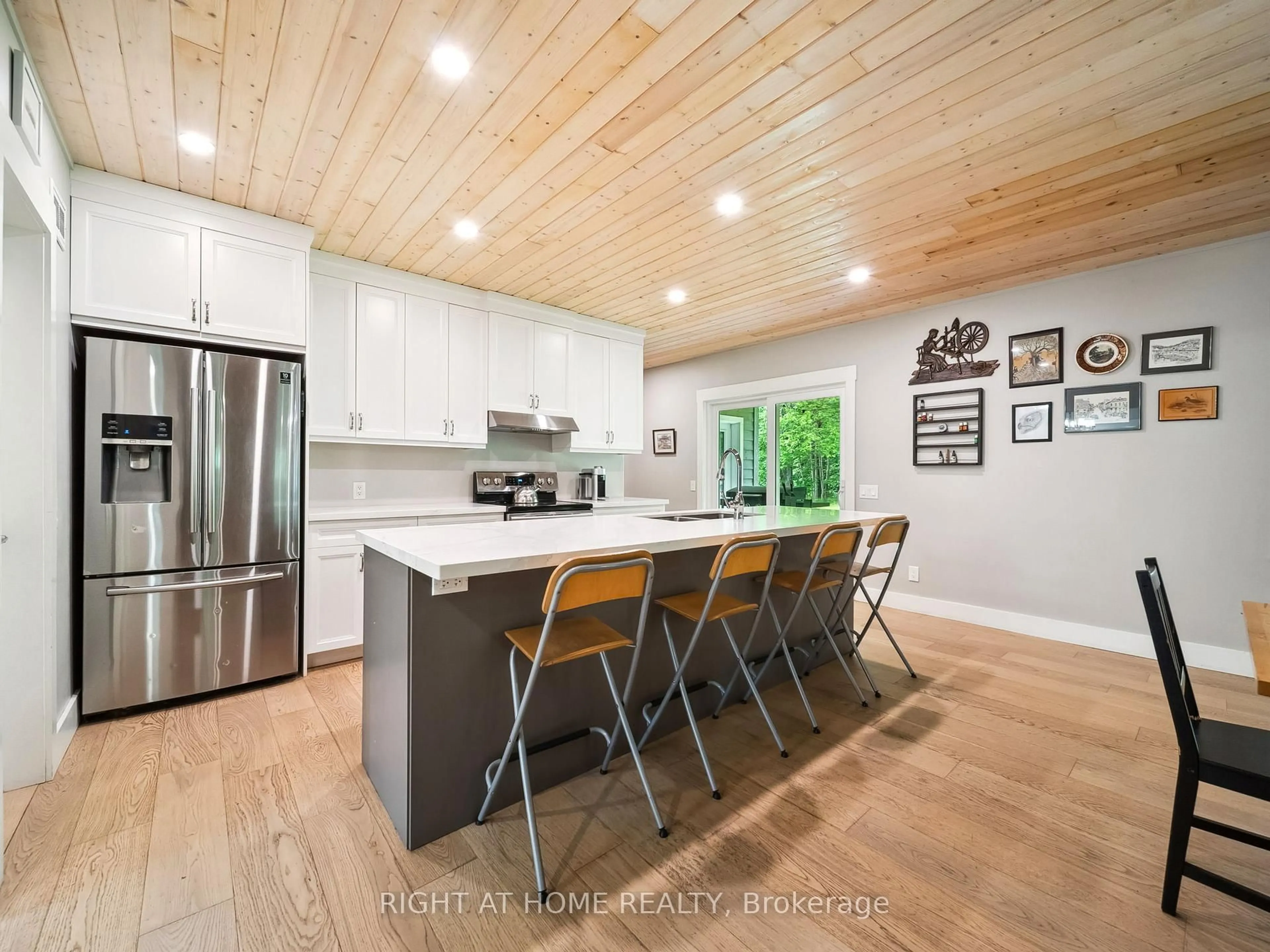 Open concept kitchen, wood/laminate floor for 4098 Cambrian Rd, Severn Ontario L0K 2B0