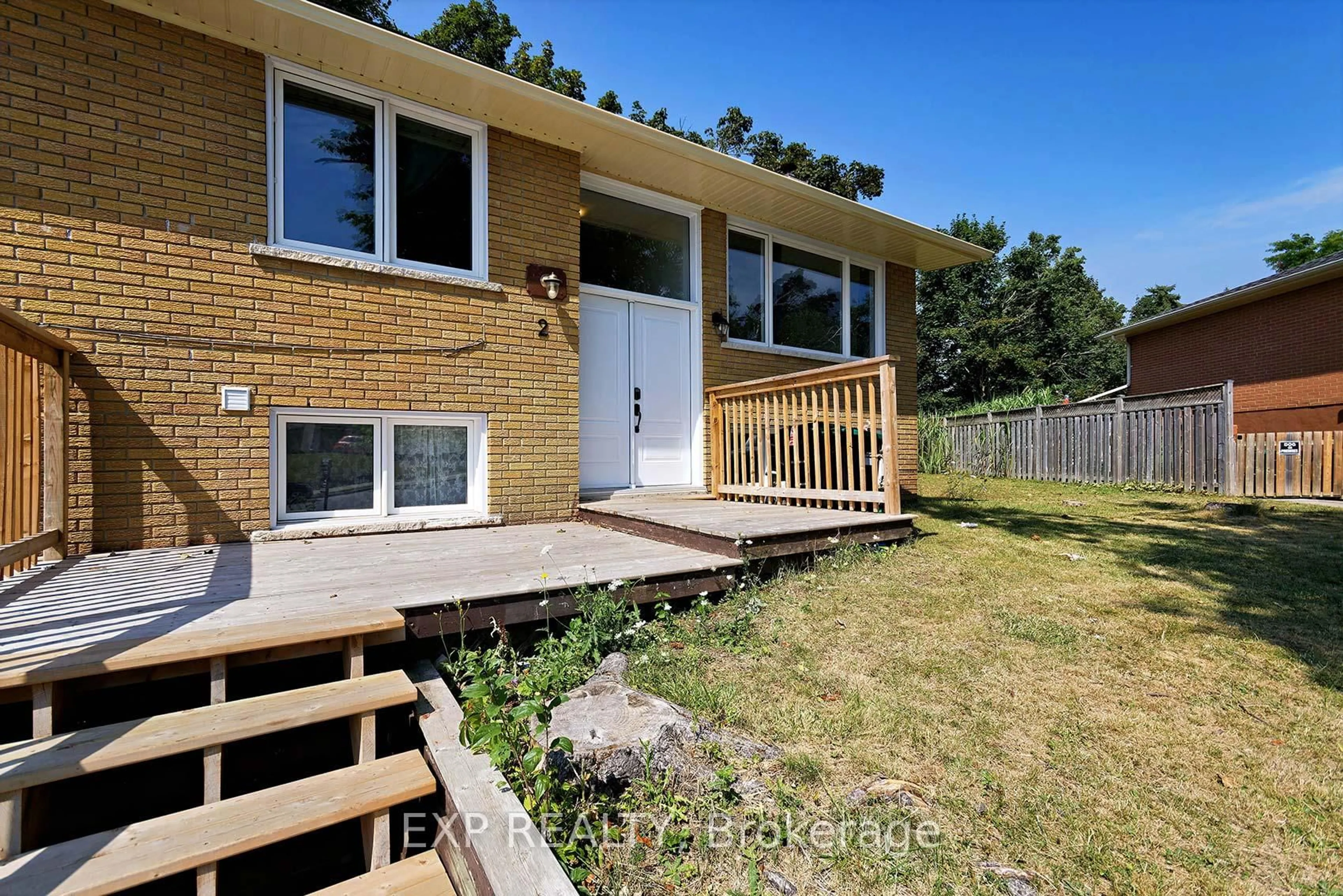 Home with brick exterior material, street for 2 Roslyn Rd, Barrie Ontario L4M 2X6