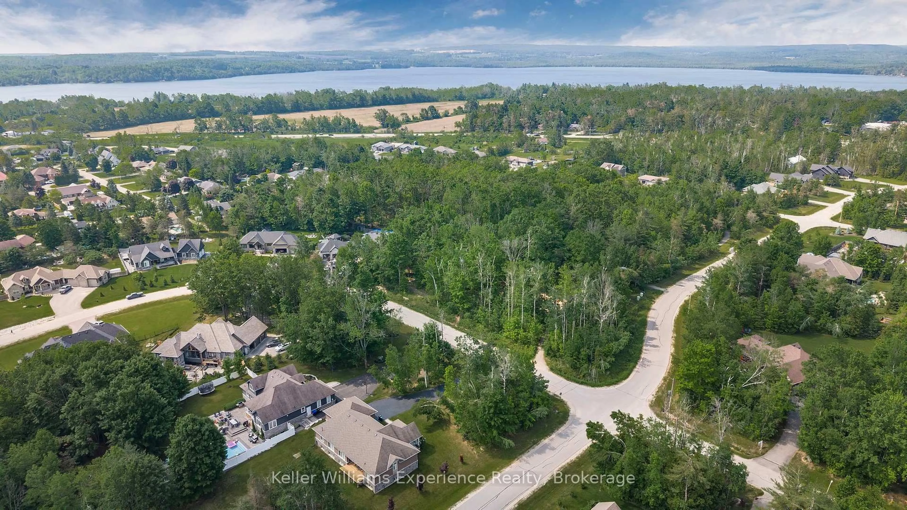 A pic from outside/outdoor area/front of a property/back of a property/a pic from drone, water/lake/river/ocean view for 2176 Elana Dr, Severn Ontario L3V 0C2