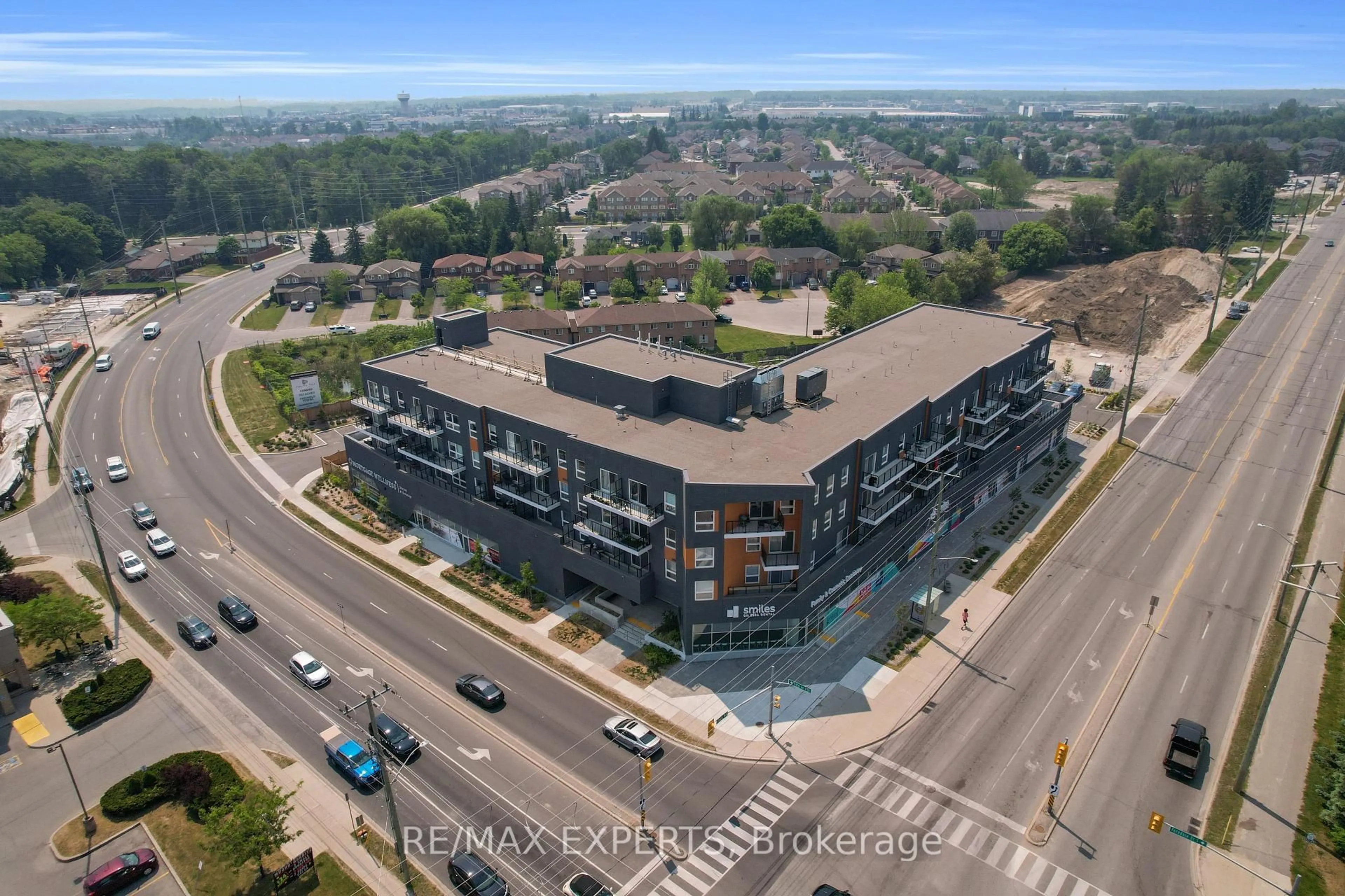 A pic from outside/outdoor area/front of a property/back of a property/a pic from drone, unknown for 430 Essa Rd #209, Barrie Ontario L9J 0M1