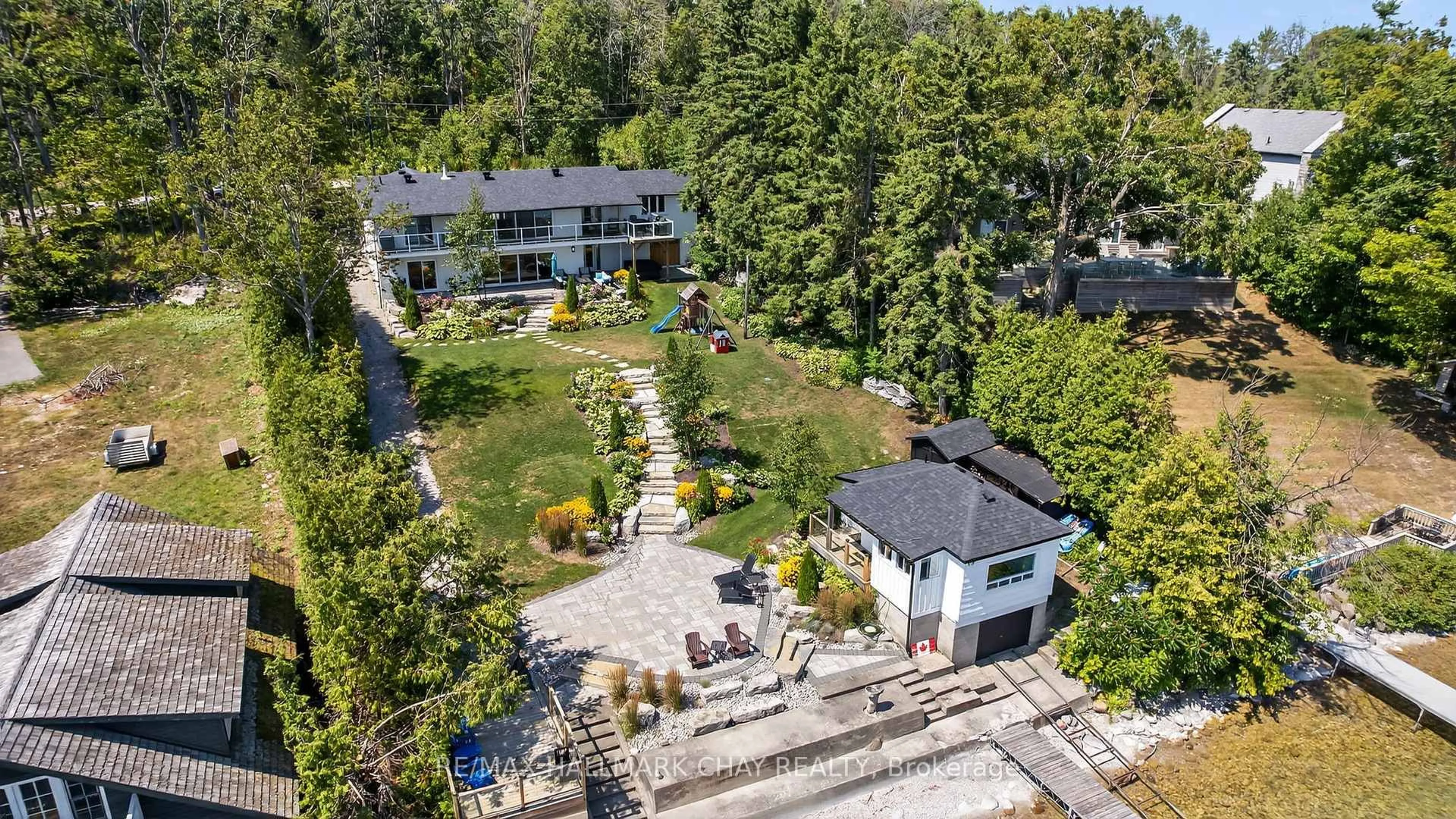 A pic from outside/outdoor area/front of a property/back of a property/a pic from drone, unknown for 47 Eight Mile Point Rd, Oro-Medonte Ontario L3V 6H1