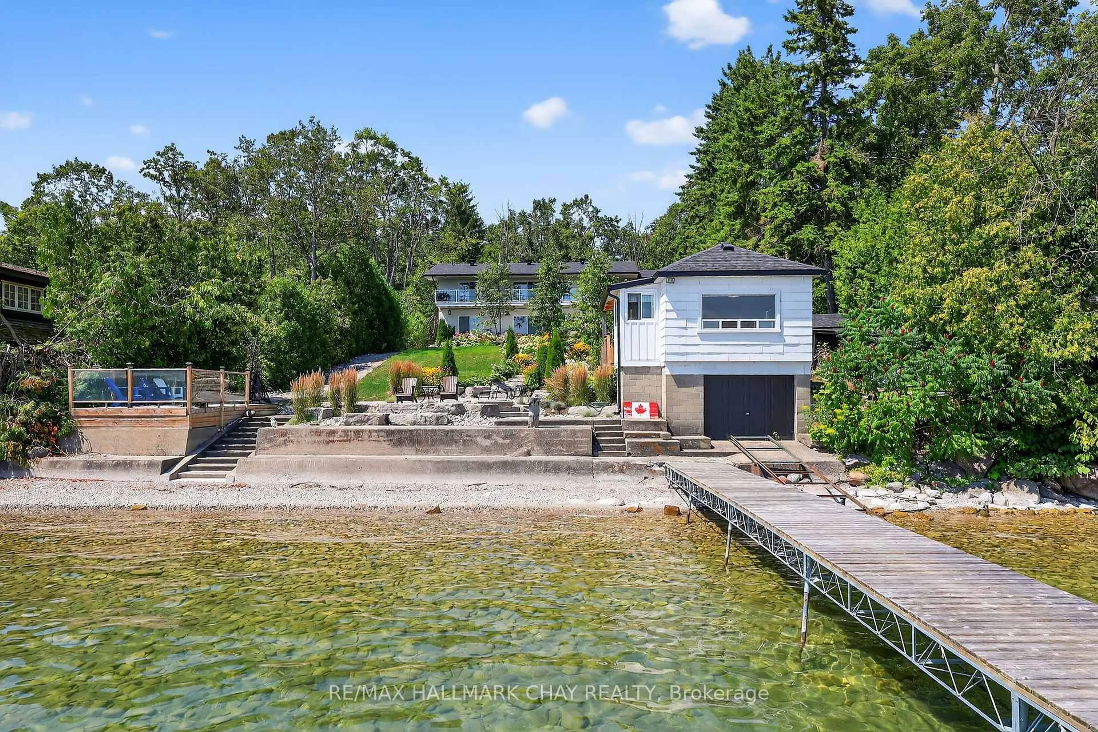A pic from outside/outdoor area/front of a property/back of a property/a pic from drone, water/lake/river/ocean view for 47 Eight Mile Point Rd, Oro-Medonte Ontario L3V 6H1