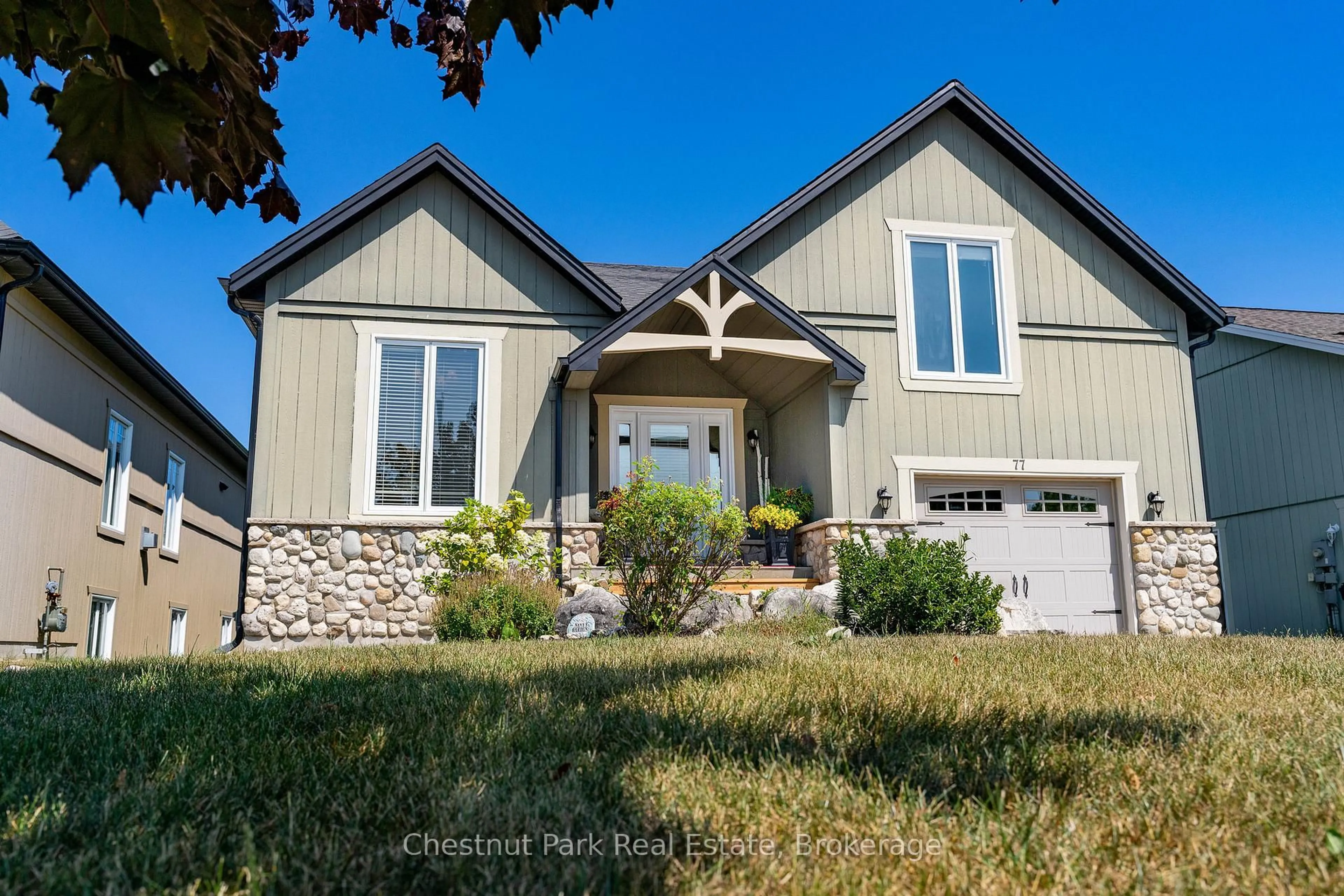 Home with vinyl exterior material, street for 77 Findlay Dr, Collingwood Ontario L9Y 0G6