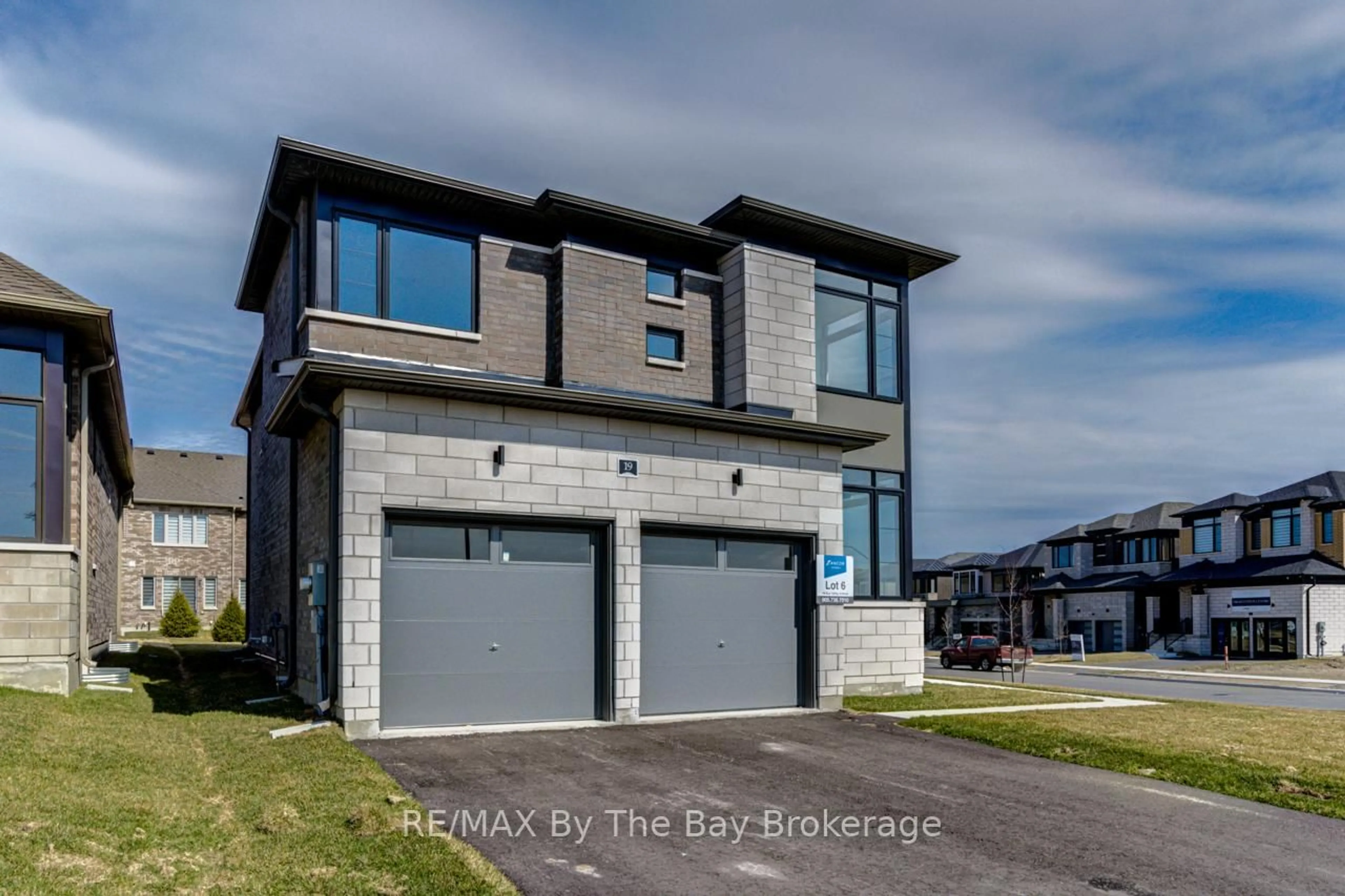 Home with brick exterior material, street for 19 Sun Valley Ave, Wasaga Beach Ontario L9Z 0N6