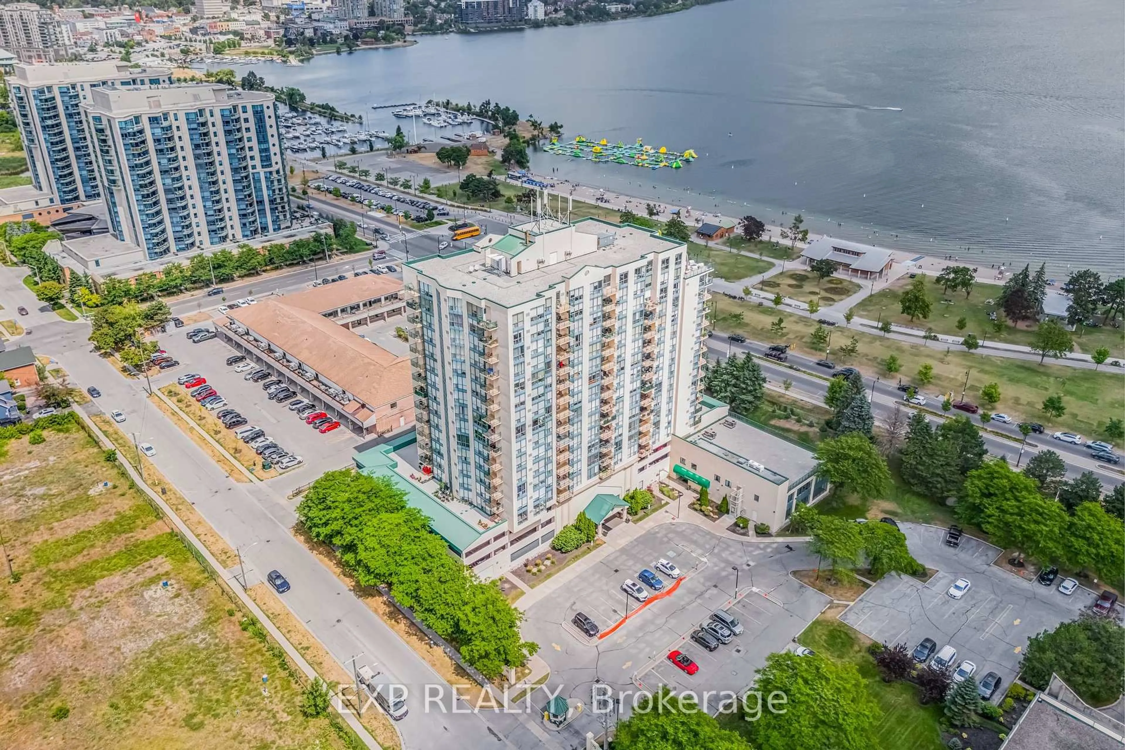 A pic from outside/outdoor area/front of a property/back of a property/a pic from drone, water/lake/river/ocean view for 65 Ellen St #1502, Barrie Ontario L4N 3A5