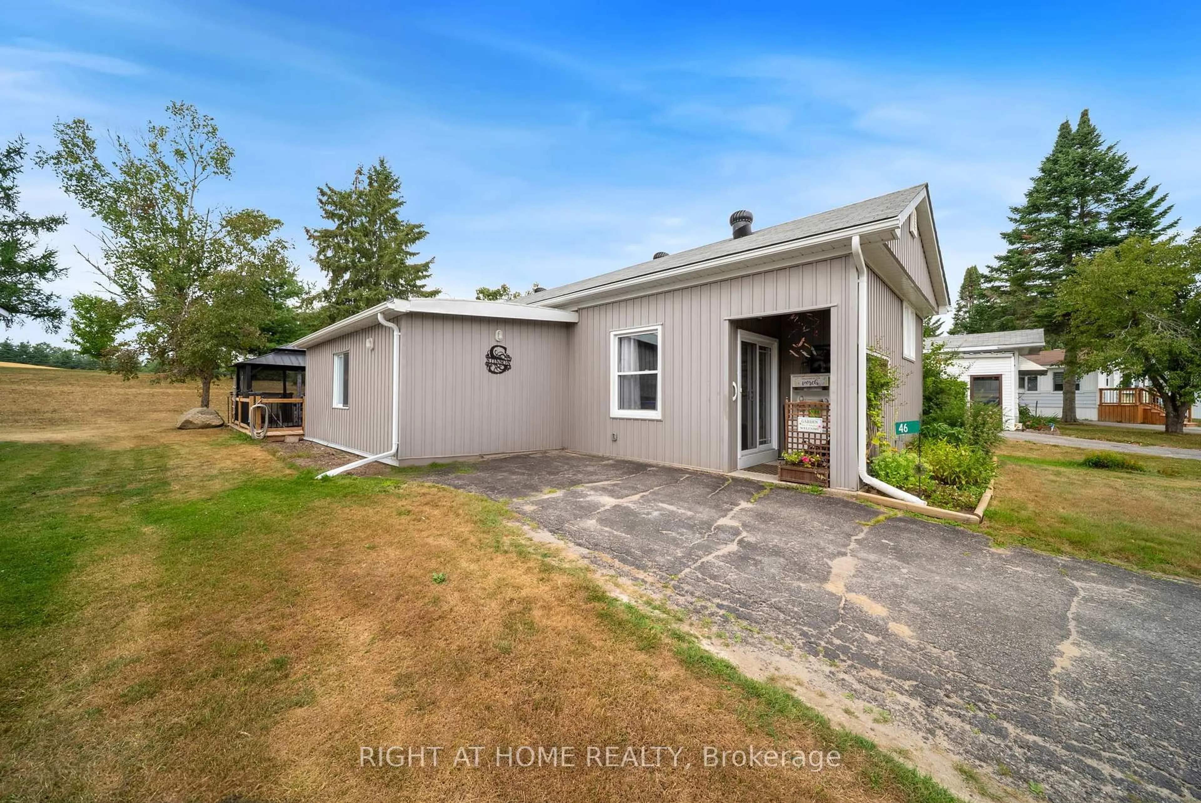A pic from outside/outdoor area/front of a property/back of a property/a pic from drone, street for 46 Cameron Dr, Oro-Medonte Ontario L0L 1T0