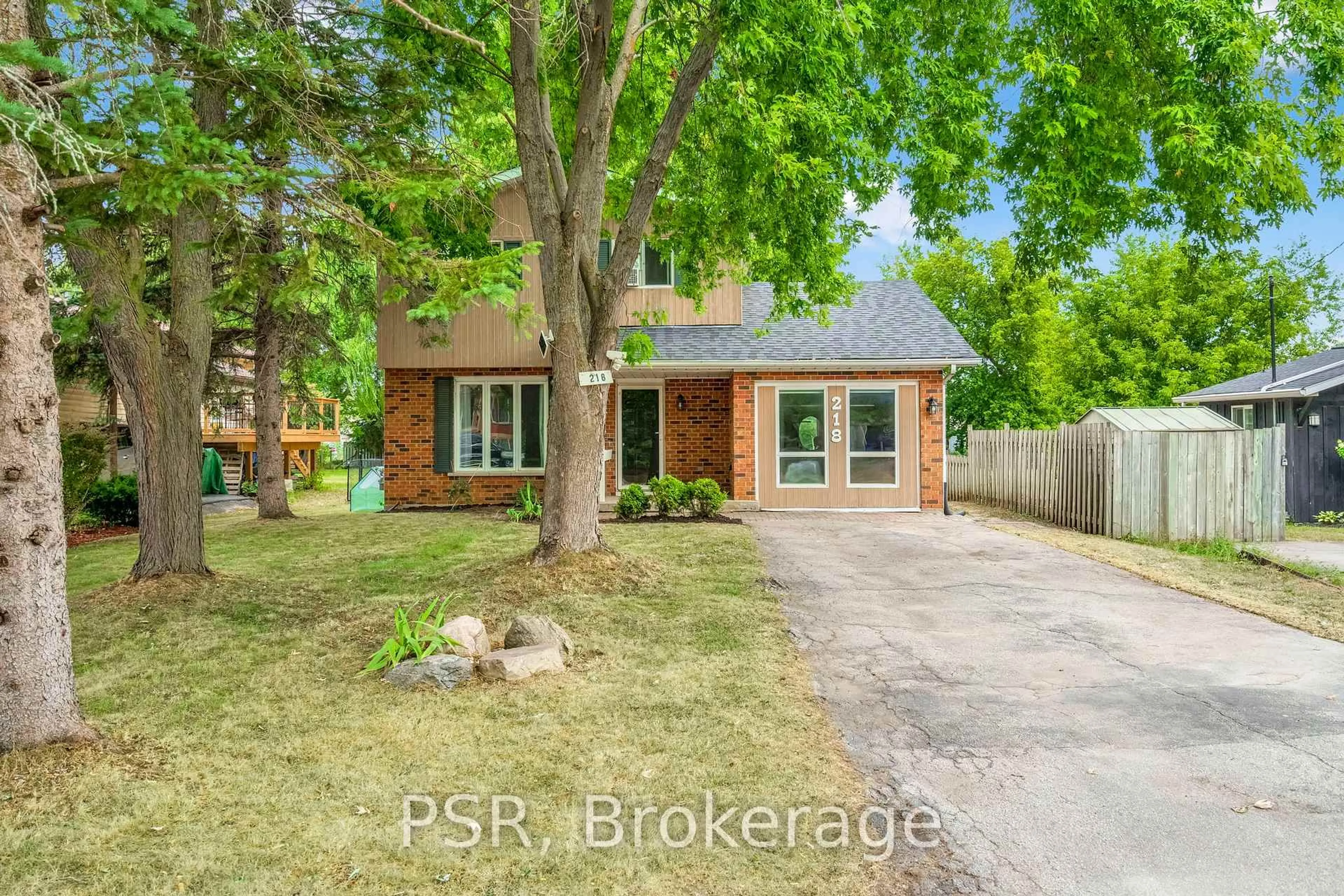 Home with brick exterior material, street for 218 John St, Clearview Ontario L0M 1S0