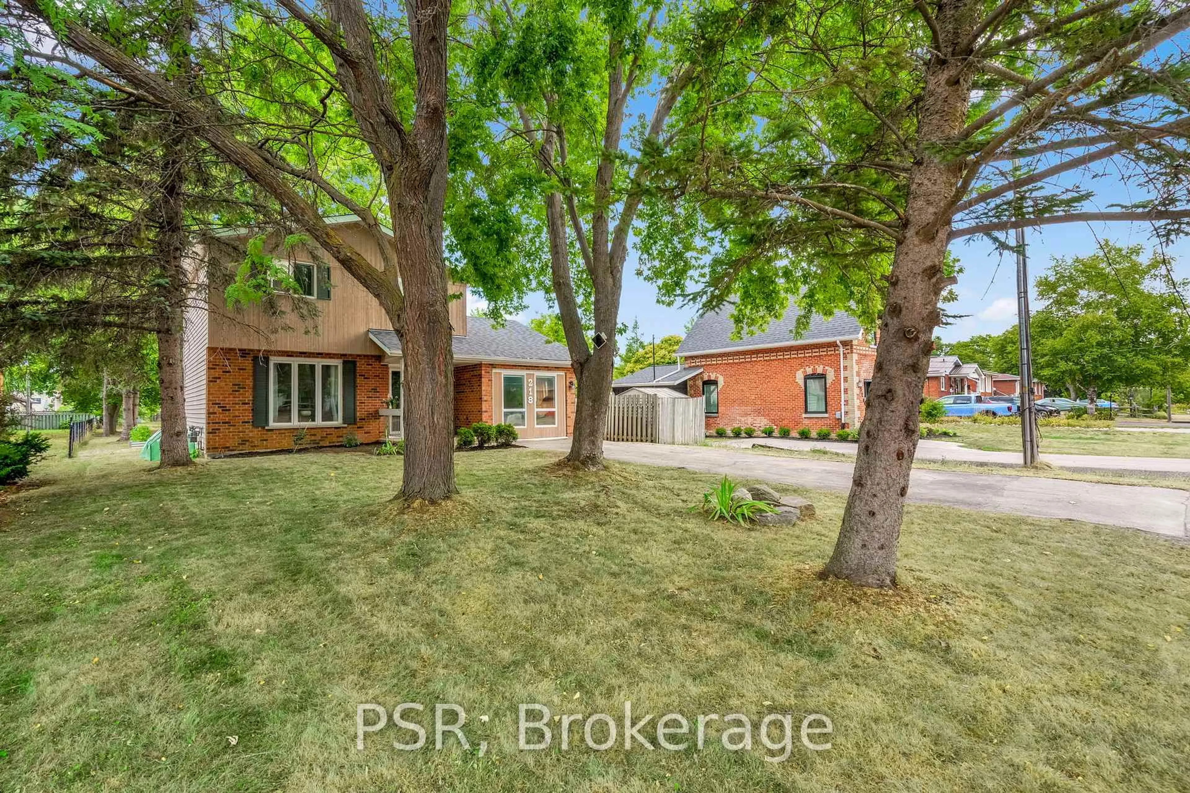 Home with brick exterior material, street for 218 John St, Clearview Ontario L0M 1S0
