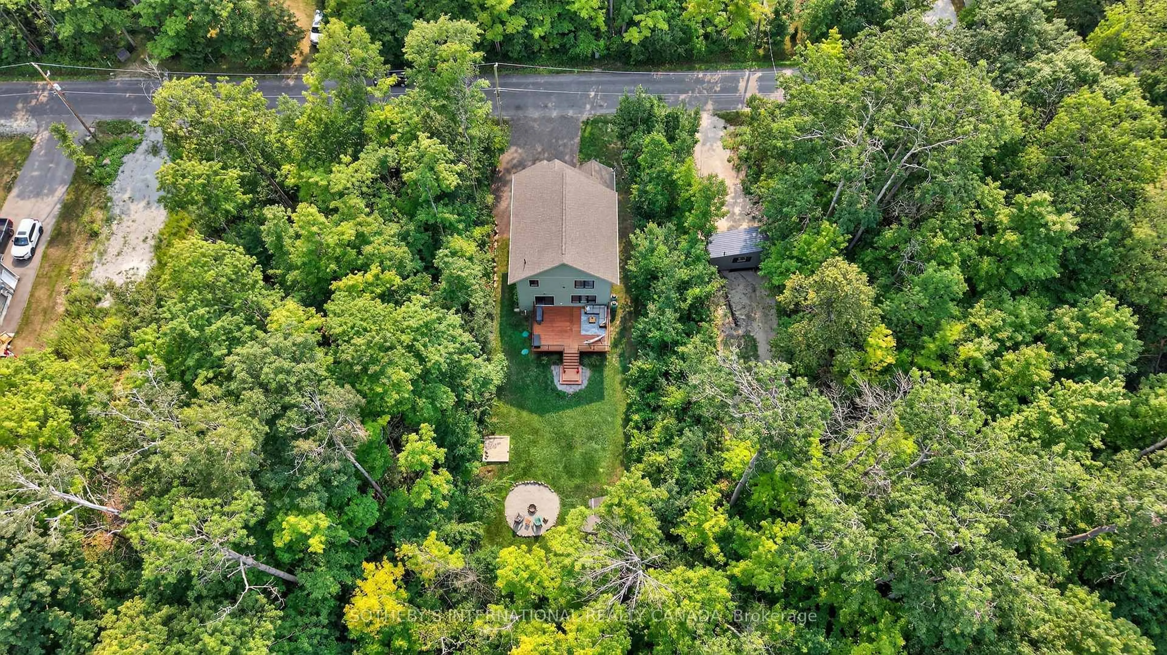 A pic from outside/outdoor area/front of a property/back of a property/a pic from drone, forest/trees view for 73 Wozniak Rd, Penetanguishene Ontario L9M 1W6