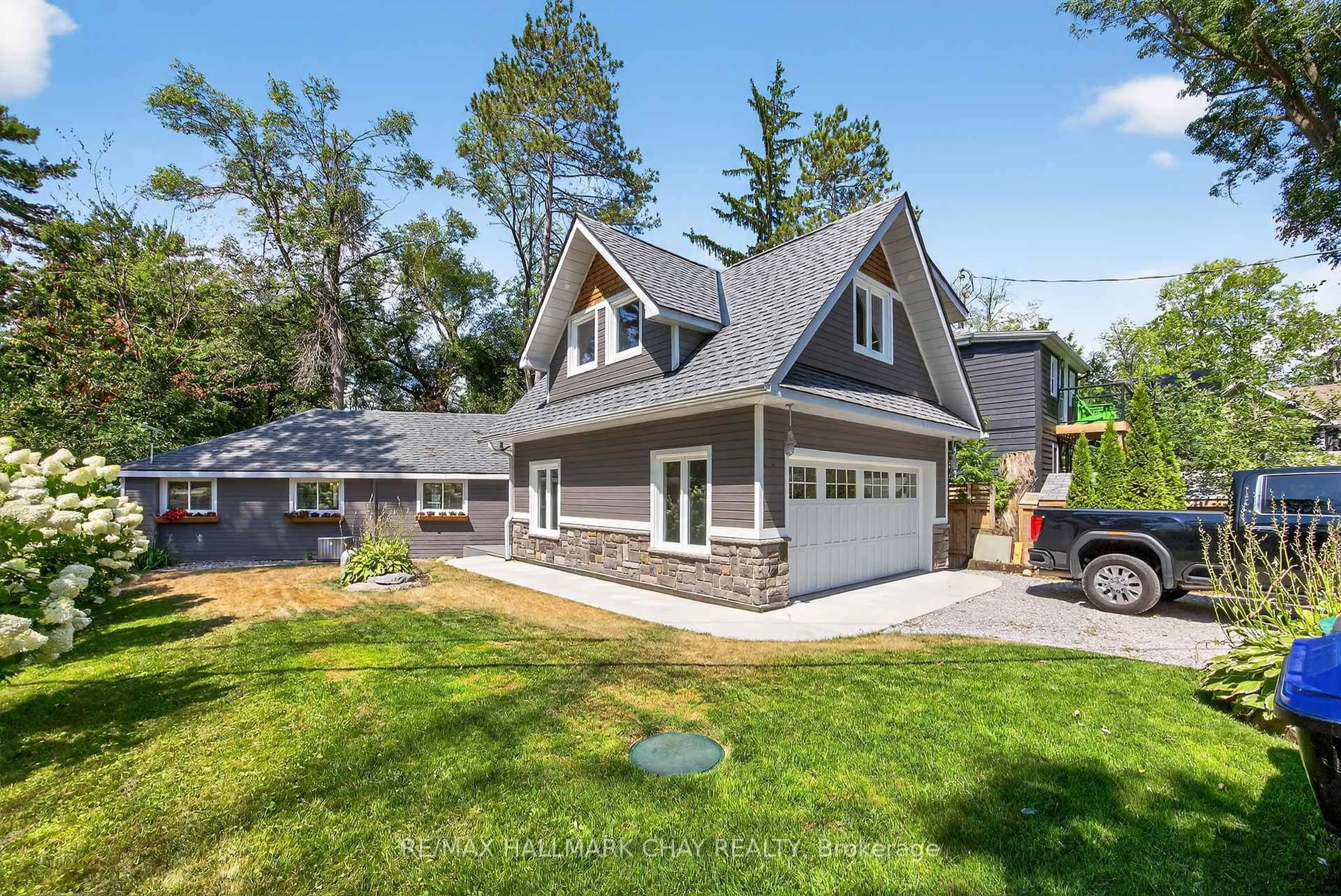 Home with vinyl exterior material, street for 7092 Beach Dr, Ramara Ontario L0K 2B0