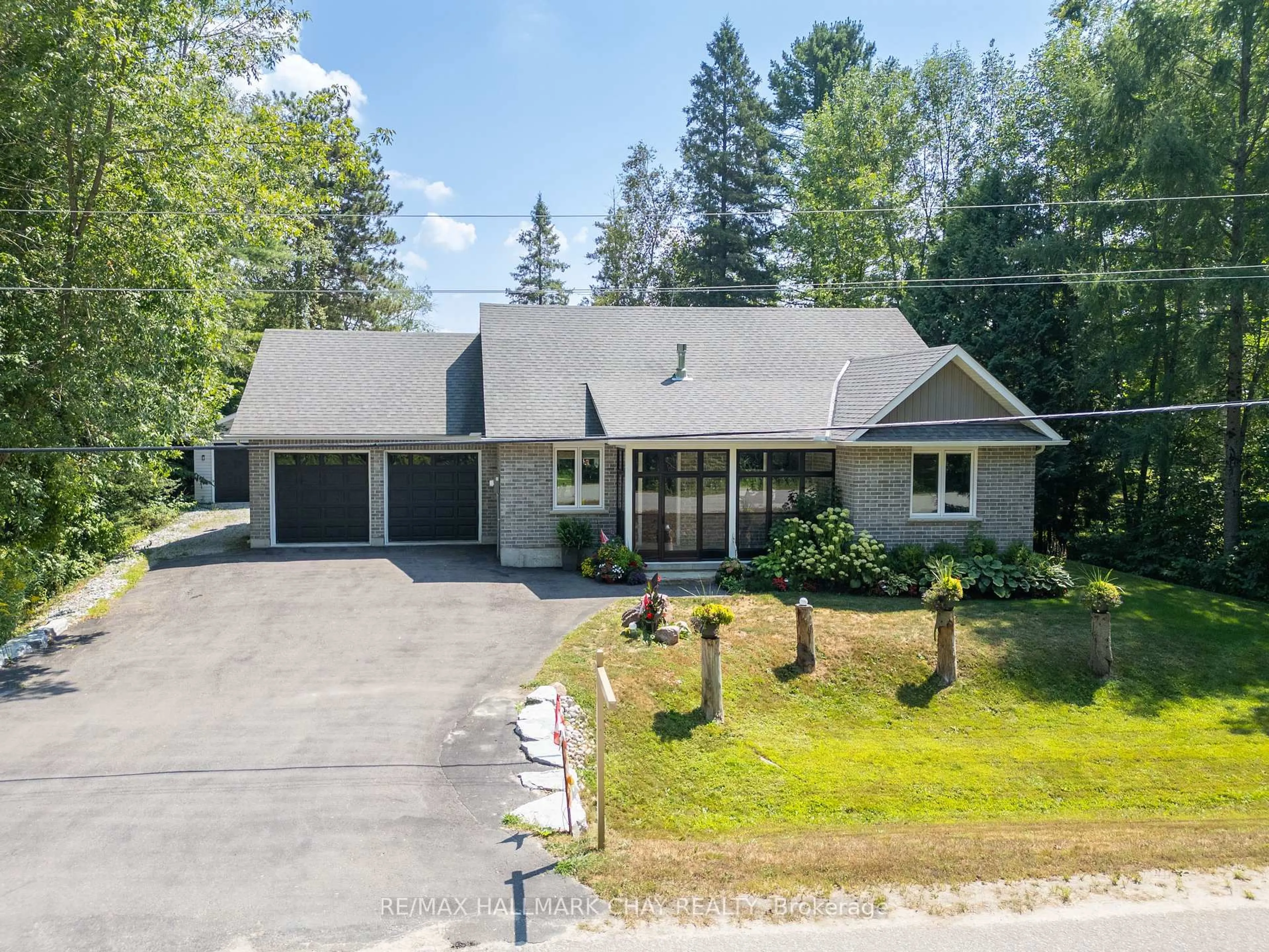 A pic from outside/outdoor area/front of a property/back of a property/a pic from drone, street for 7249 Davy Dr, Ramara Ontario L0K 2B0