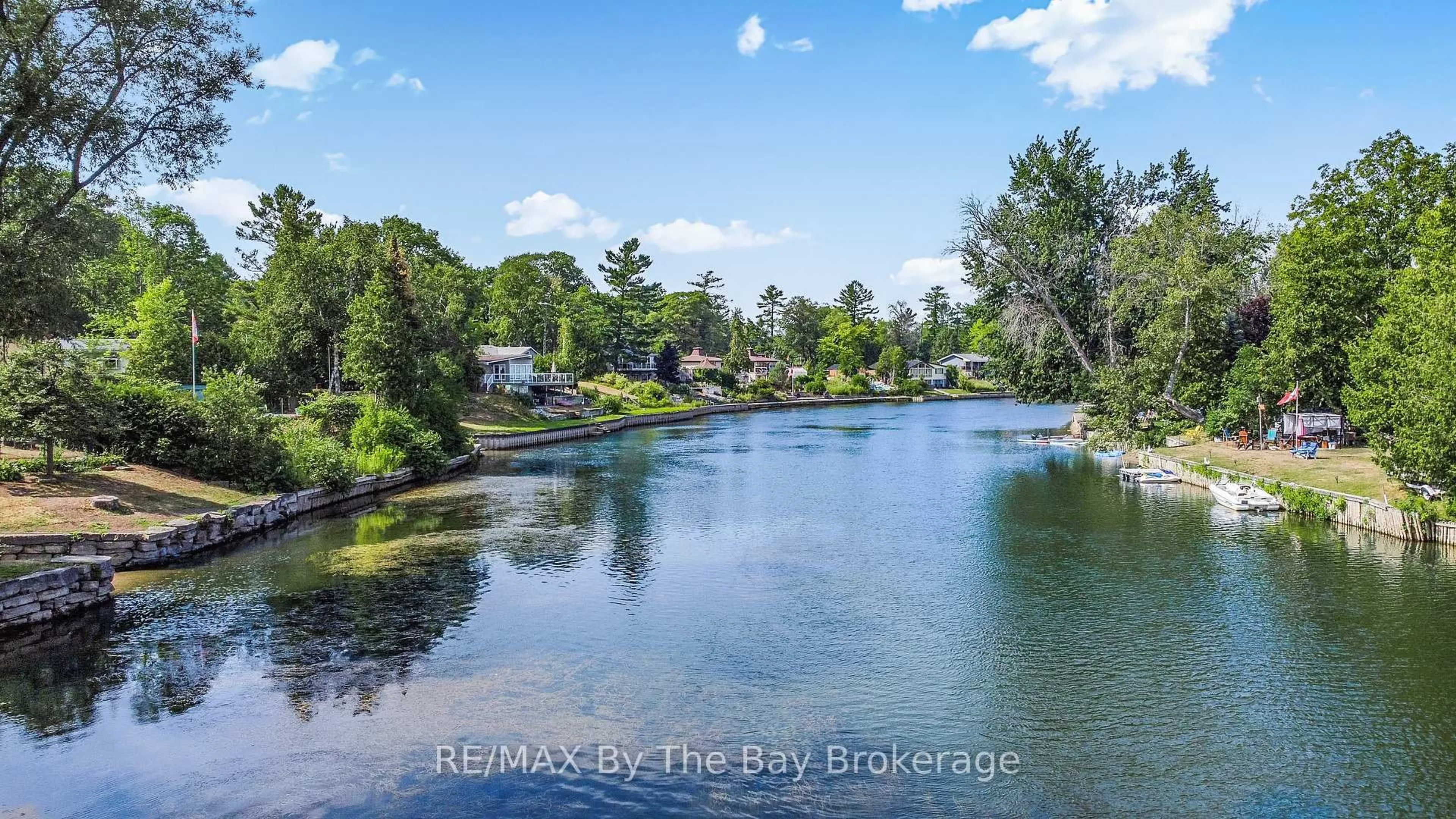 A pic from outside/outdoor area/front of a property/back of a property/a pic from drone, water/lake/river/ocean view for 103 Sunnidale Rd, Wasaga Beach Ontario L9Z 2S9
