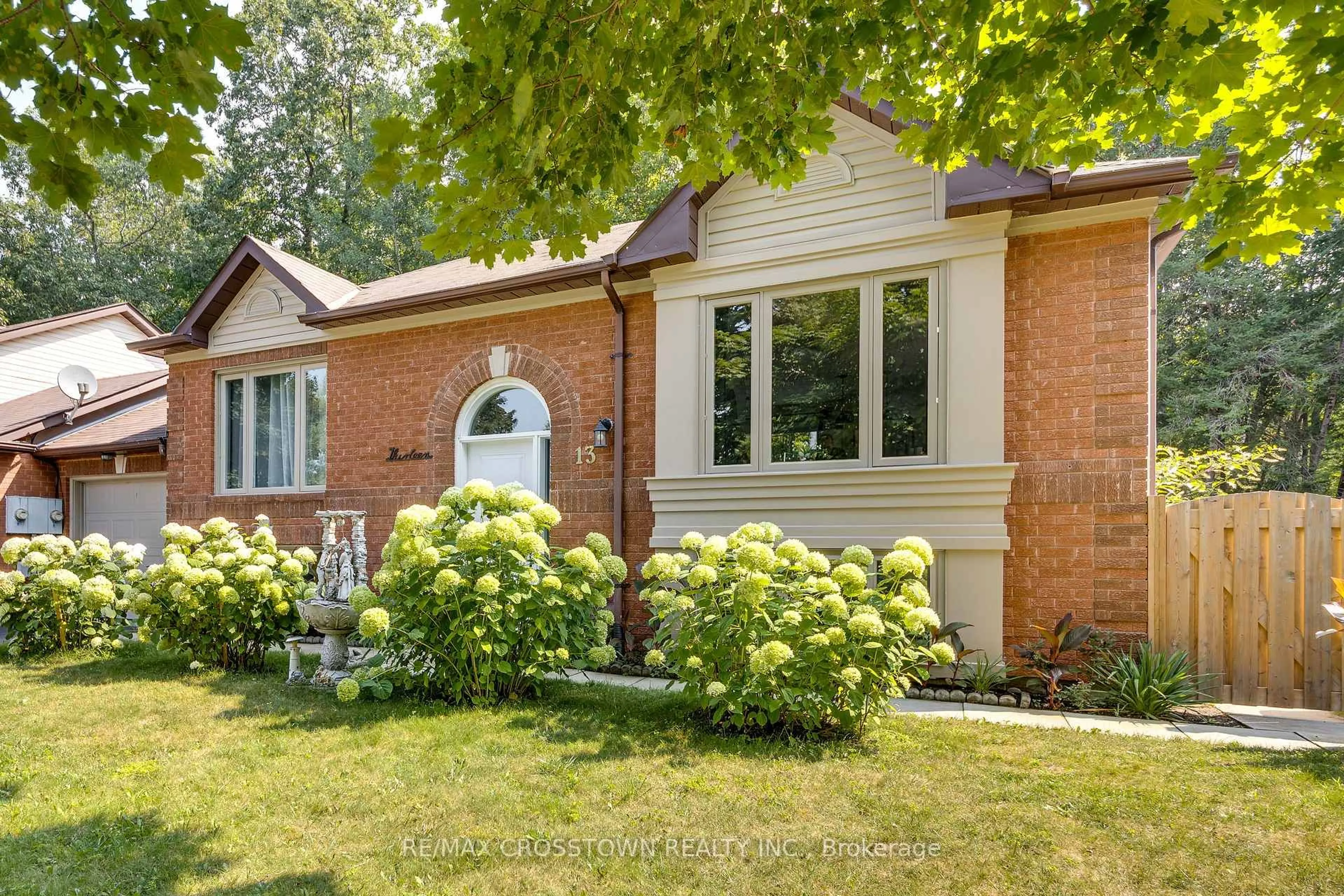 Home with brick exterior material, street for 13 Harbour Cres, Wasaga Beach Ontario L9Z 1G4