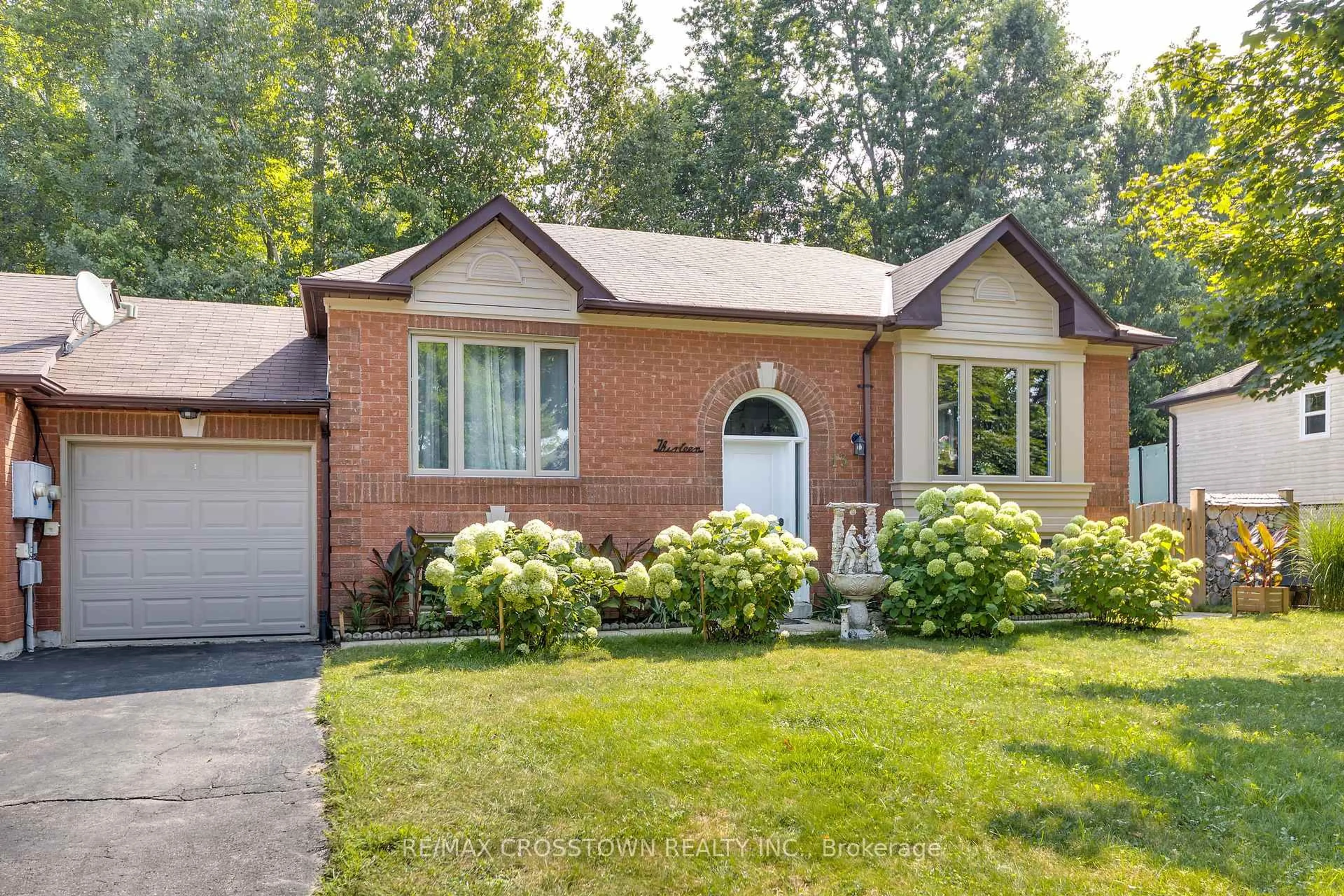 Home with brick exterior material, street for 13 Harbour Cres, Wasaga Beach Ontario L9Z 1G4