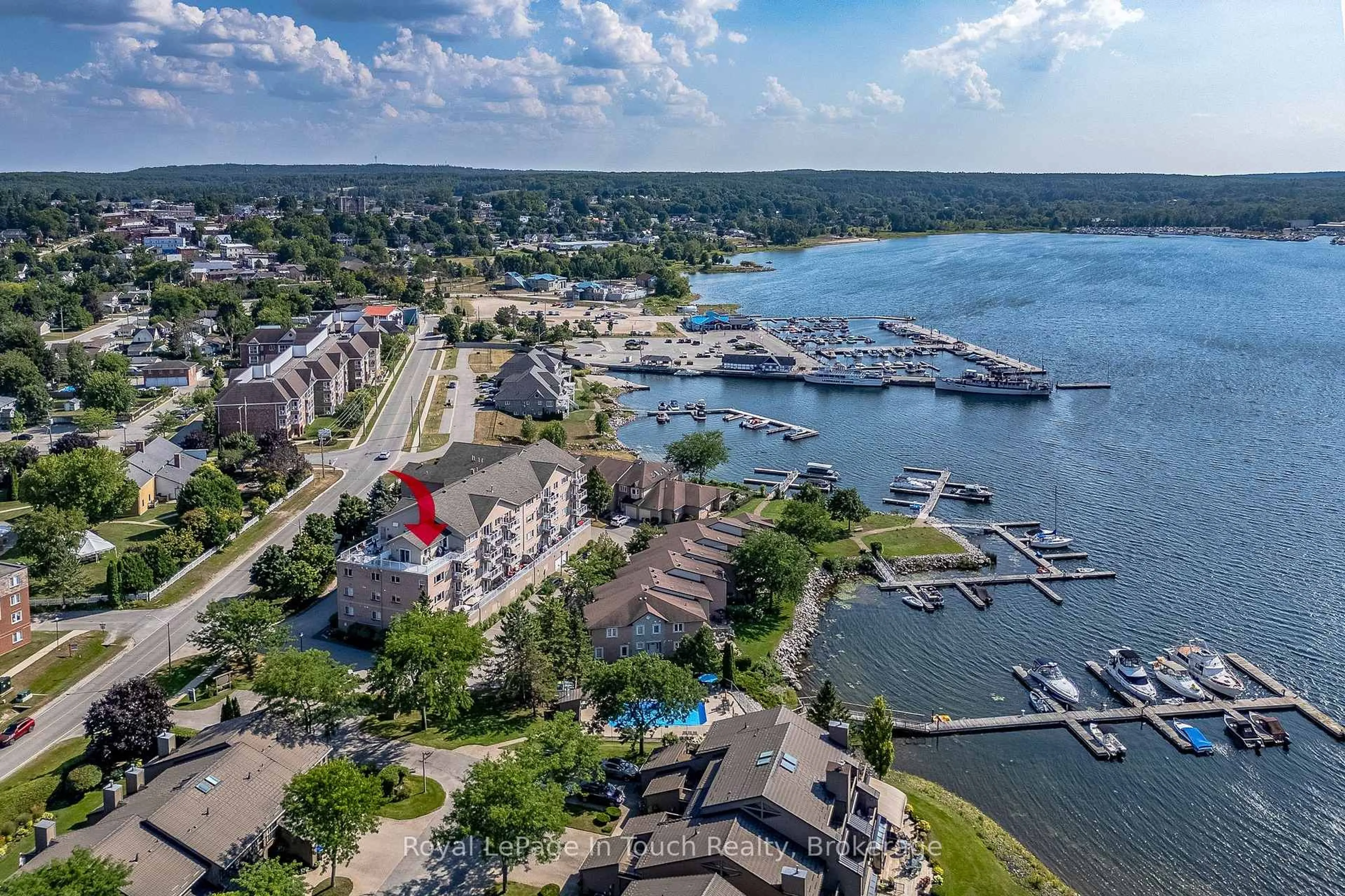 A pic from outside/outdoor area/front of a property/back of a property/a pic from drone, water/lake/river/ocean view for 4 Beck Blvd #505, Penetanguishene Ontario L9M 2H3
