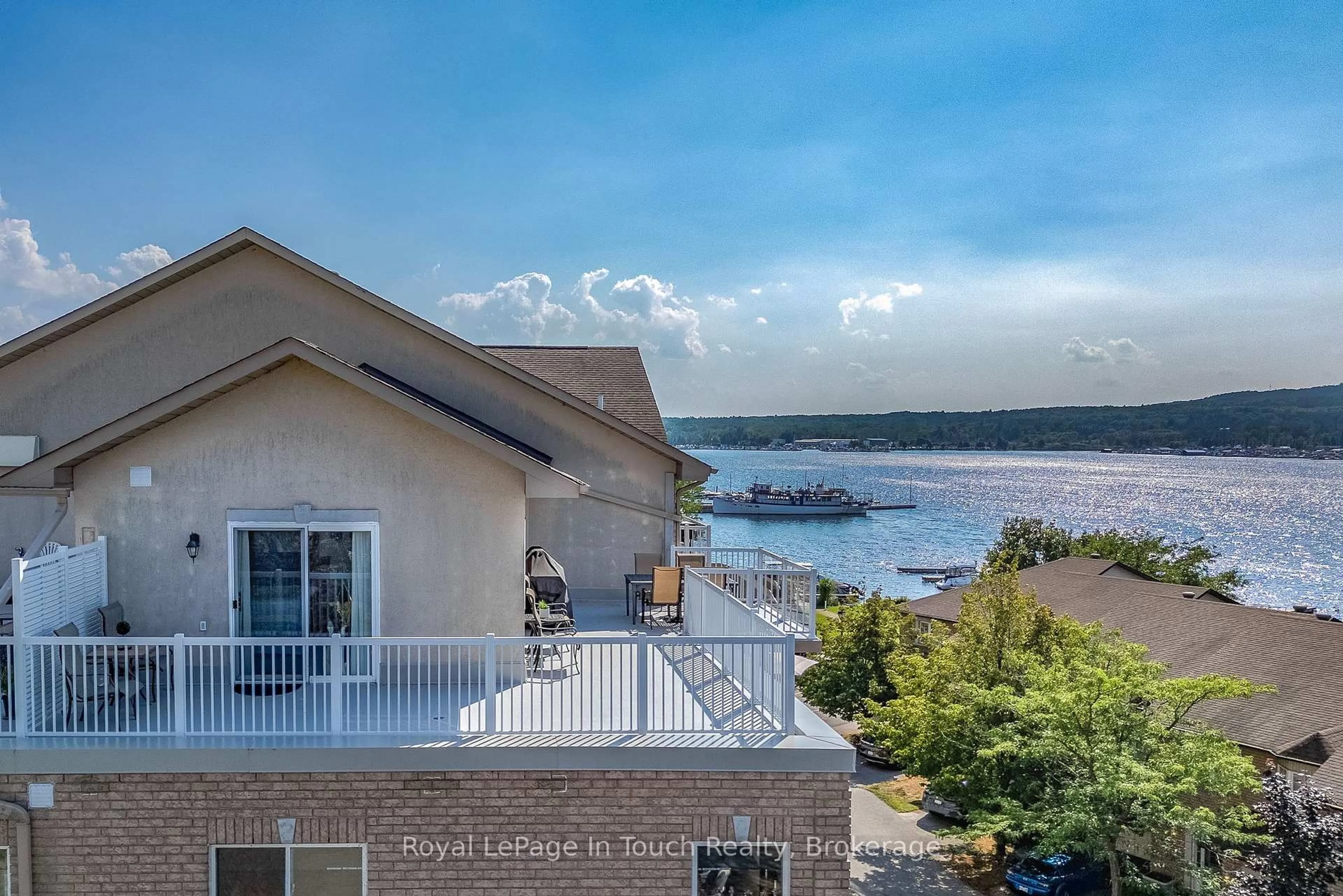 A pic from outside/outdoor area/front of a property/back of a property/a pic from drone, water/lake/river/ocean view for 4 Beck Blvd #505, Penetanguishene Ontario L9M 2H3