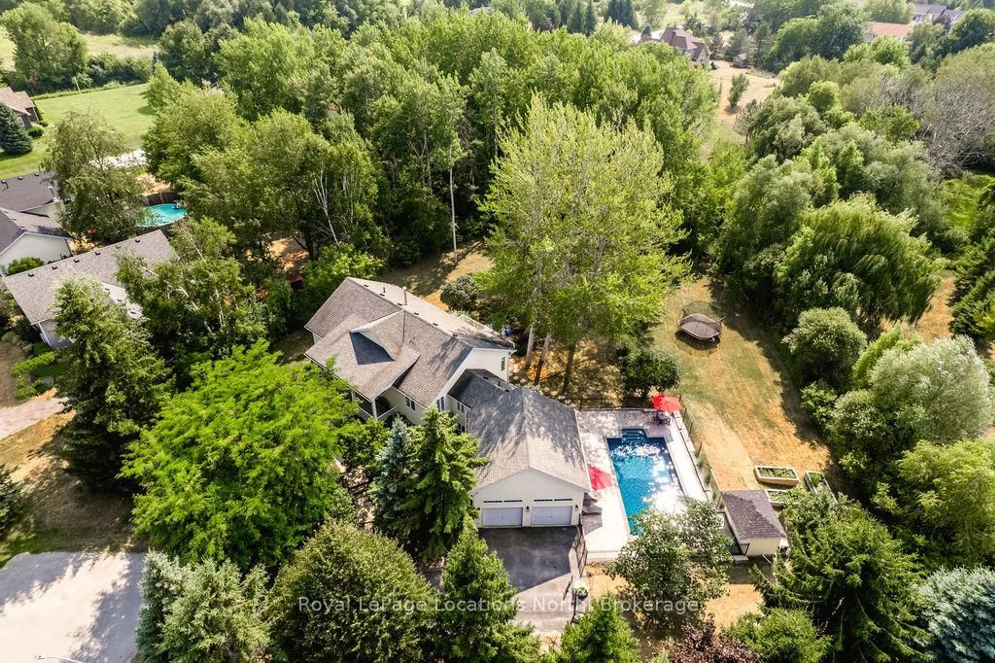 A pic from outside/outdoor area/front of a property/back of a property/a pic from drone, forest/trees view for 50 BLACKBURN Ave, Clearview Ontario L0M 1P0