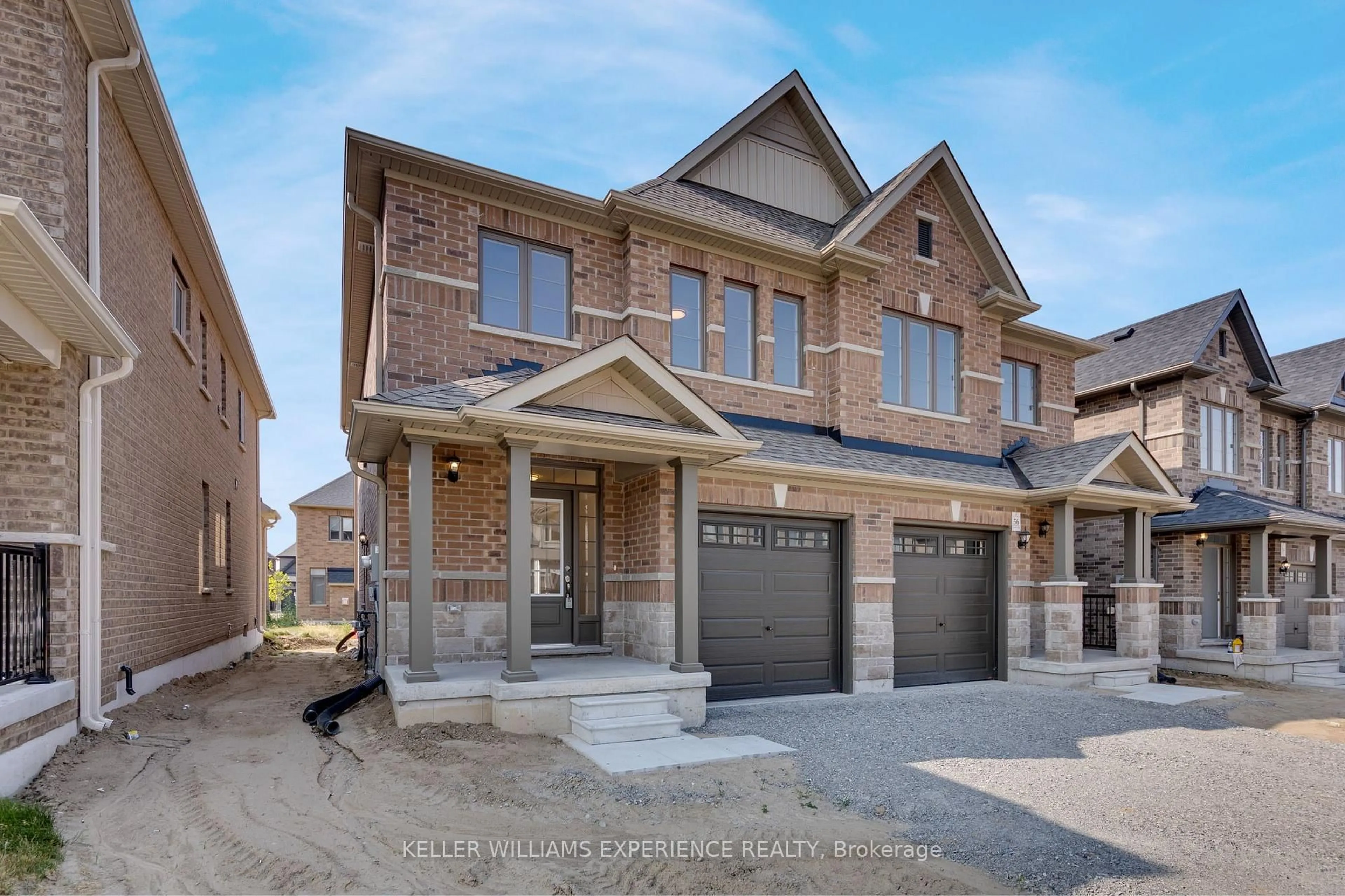 Home with brick exterior material, street for 58 Sagewood Ave, Barrie Ontario L9J 0K5