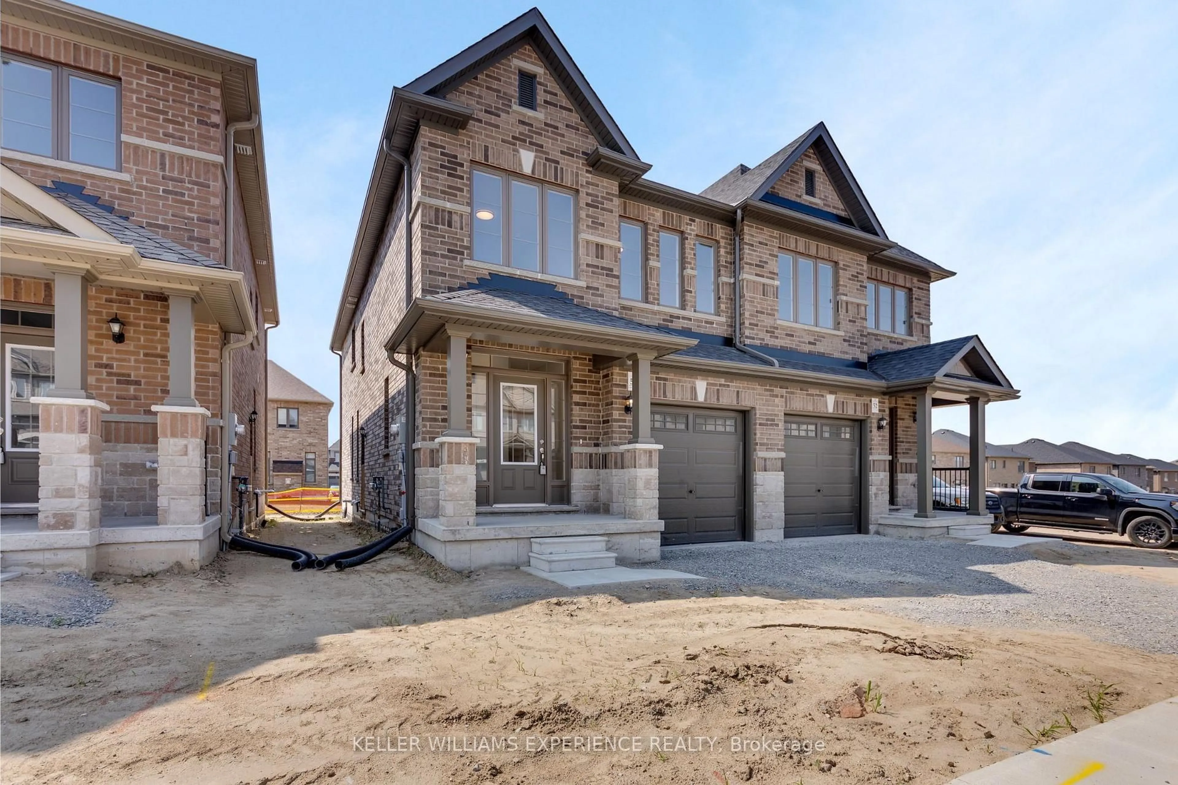 Home with brick exterior material, street for 54 Sagewood Ave, Barrie Ontario L9J 0K5